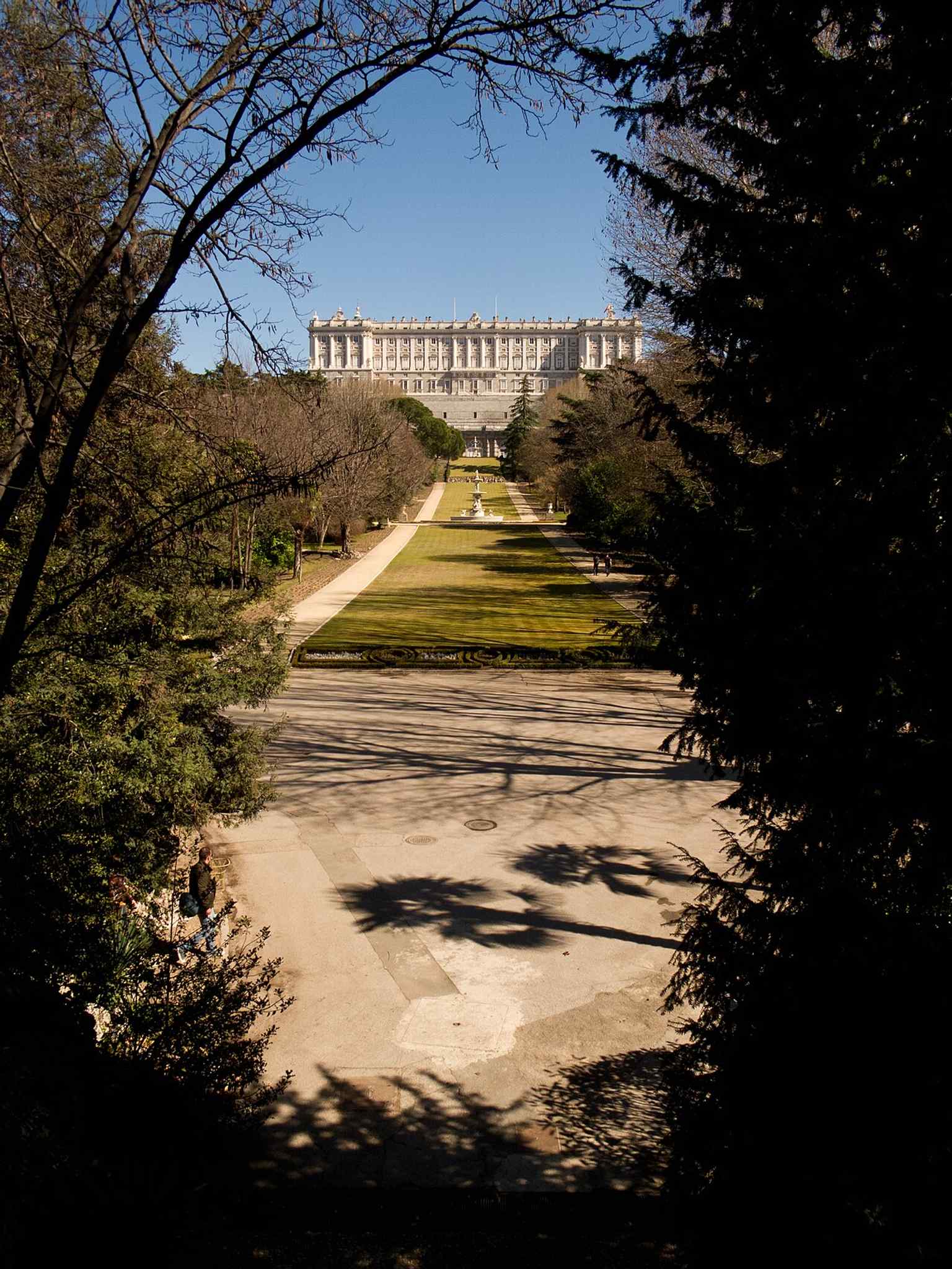 The west side seen from Campo del Moro, showing the palace’s garden setting on the opposite flank.