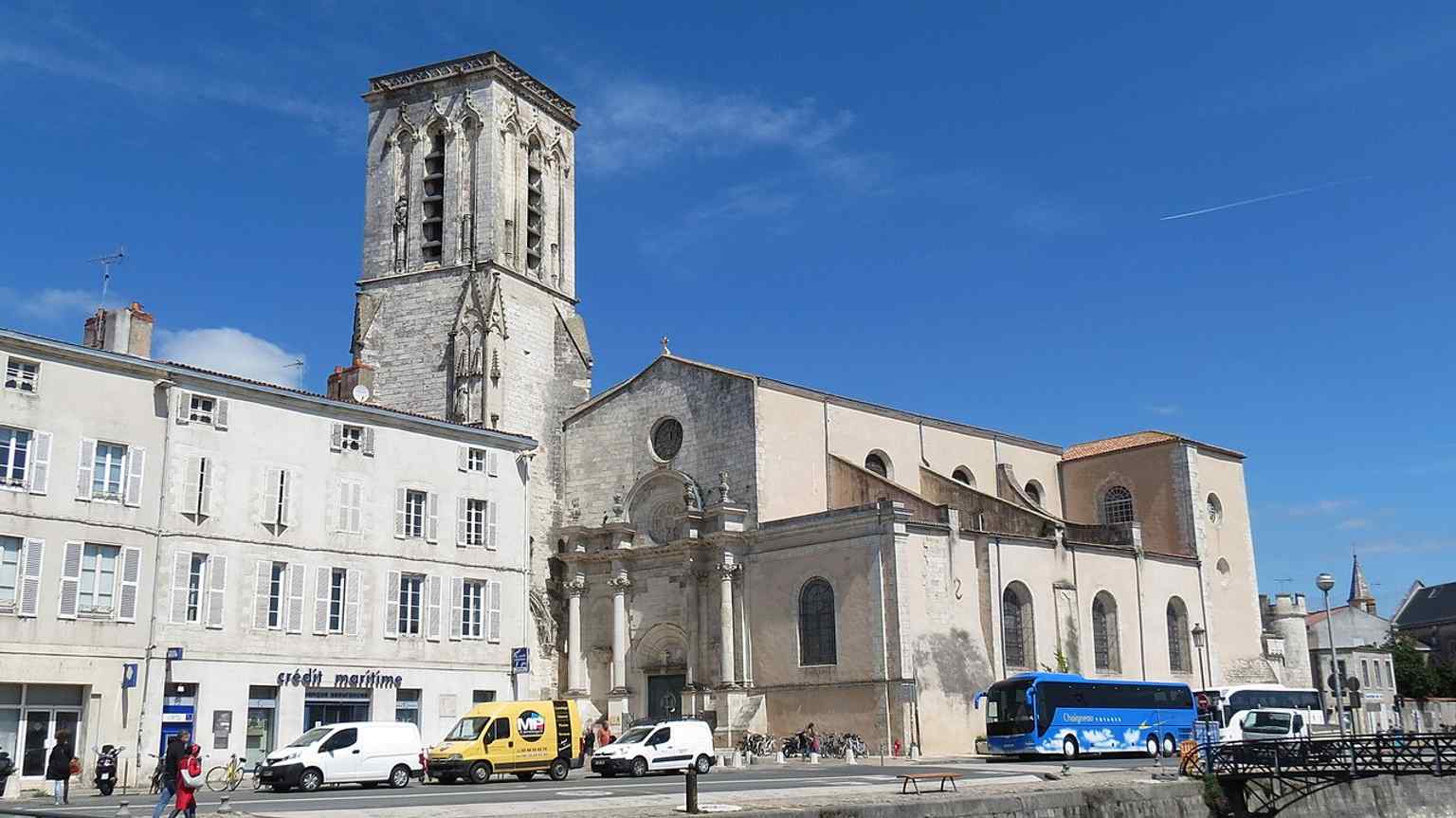 A documentary-style view that shows the church in its urban context, useful for explaining its relationship to the old harbor district.
