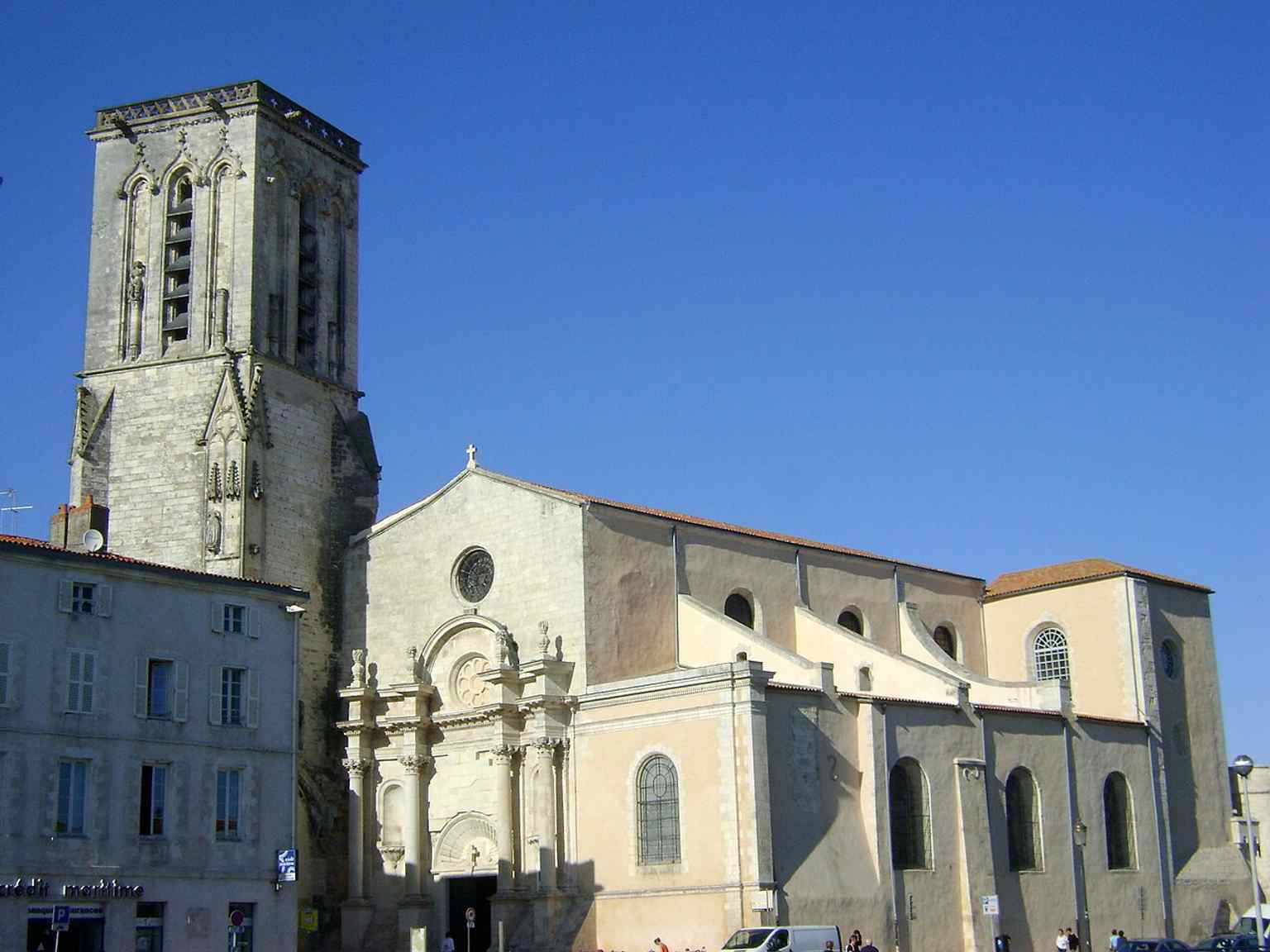 A broader façade view that helps show the church as a substantial urban landmark, even though it sits slightly set back from the street.