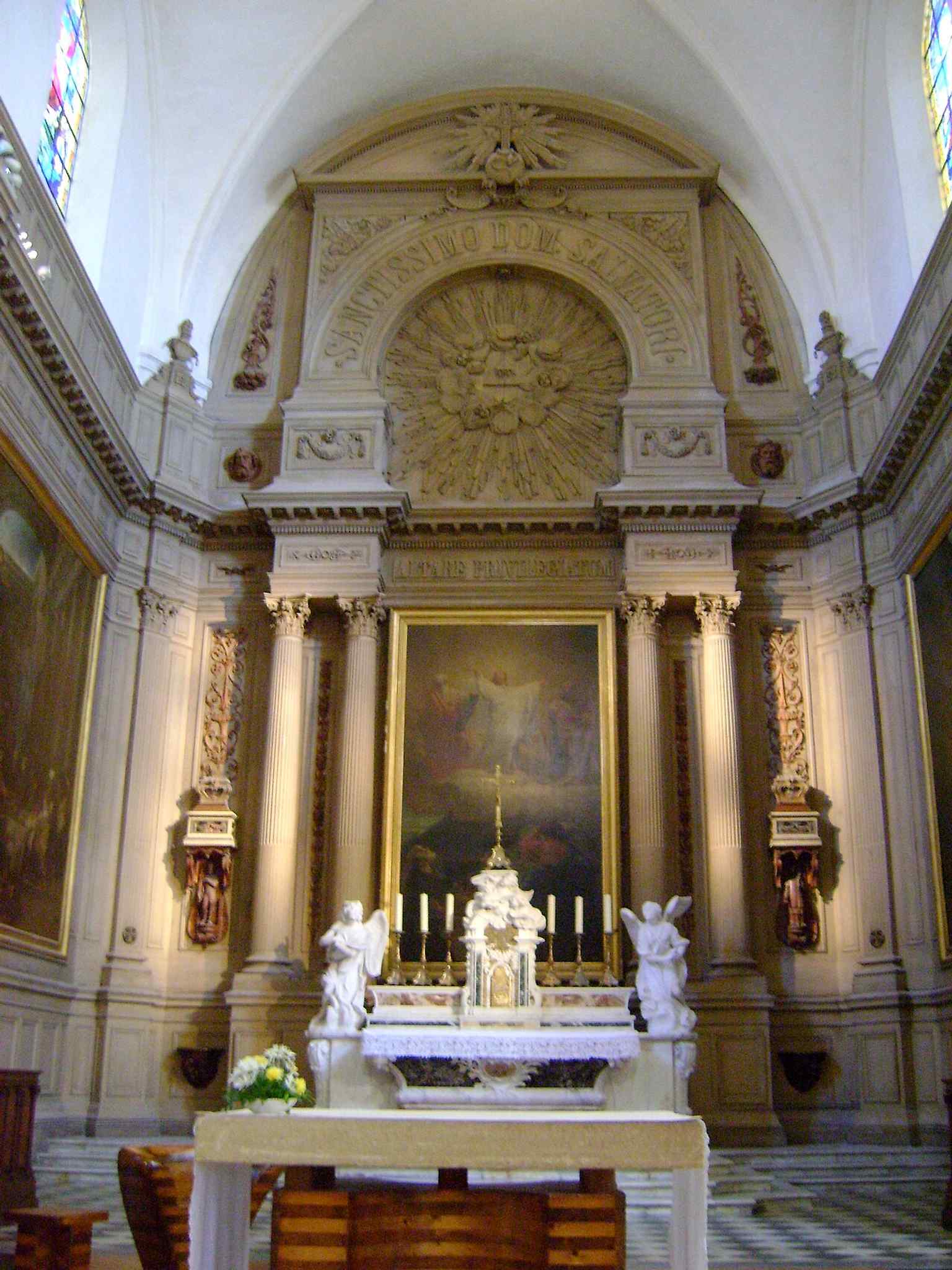 The chancel with its altar area, where the church’s restored interior hosts major artworks and liturgical furnishings.