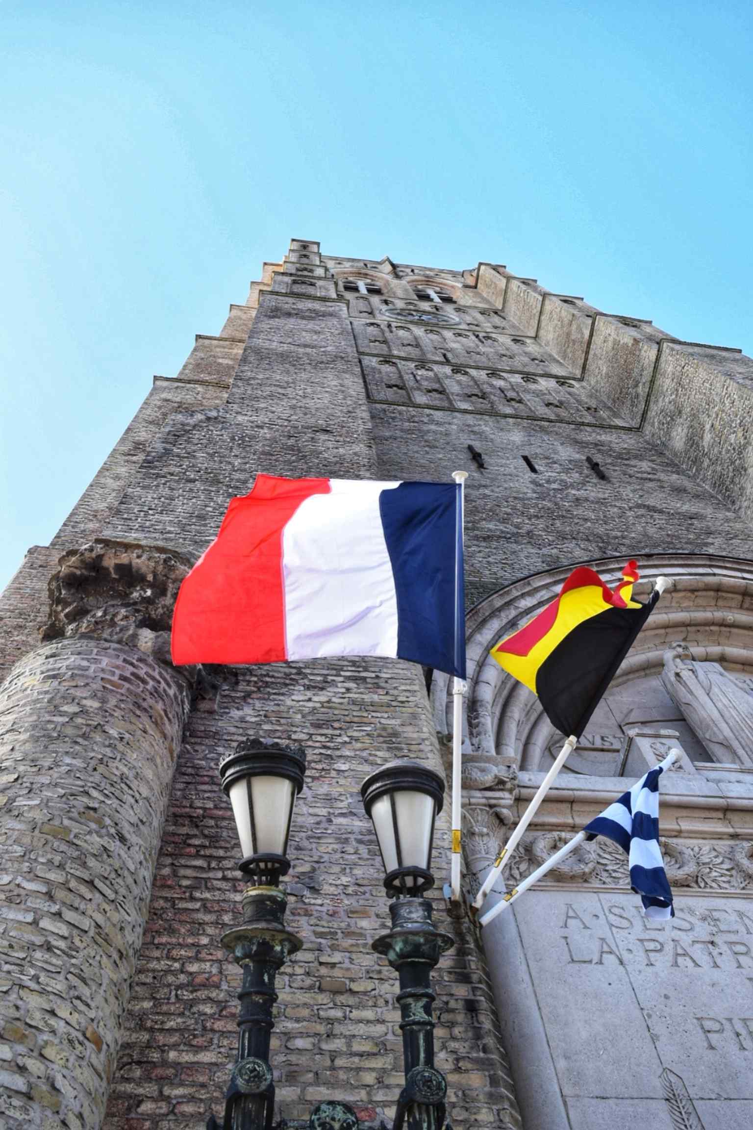 Historic belfry view of Saint-Éloi, showing the landmark listed long before the church itself and reminding us of the medieval tower that outlived the old church.