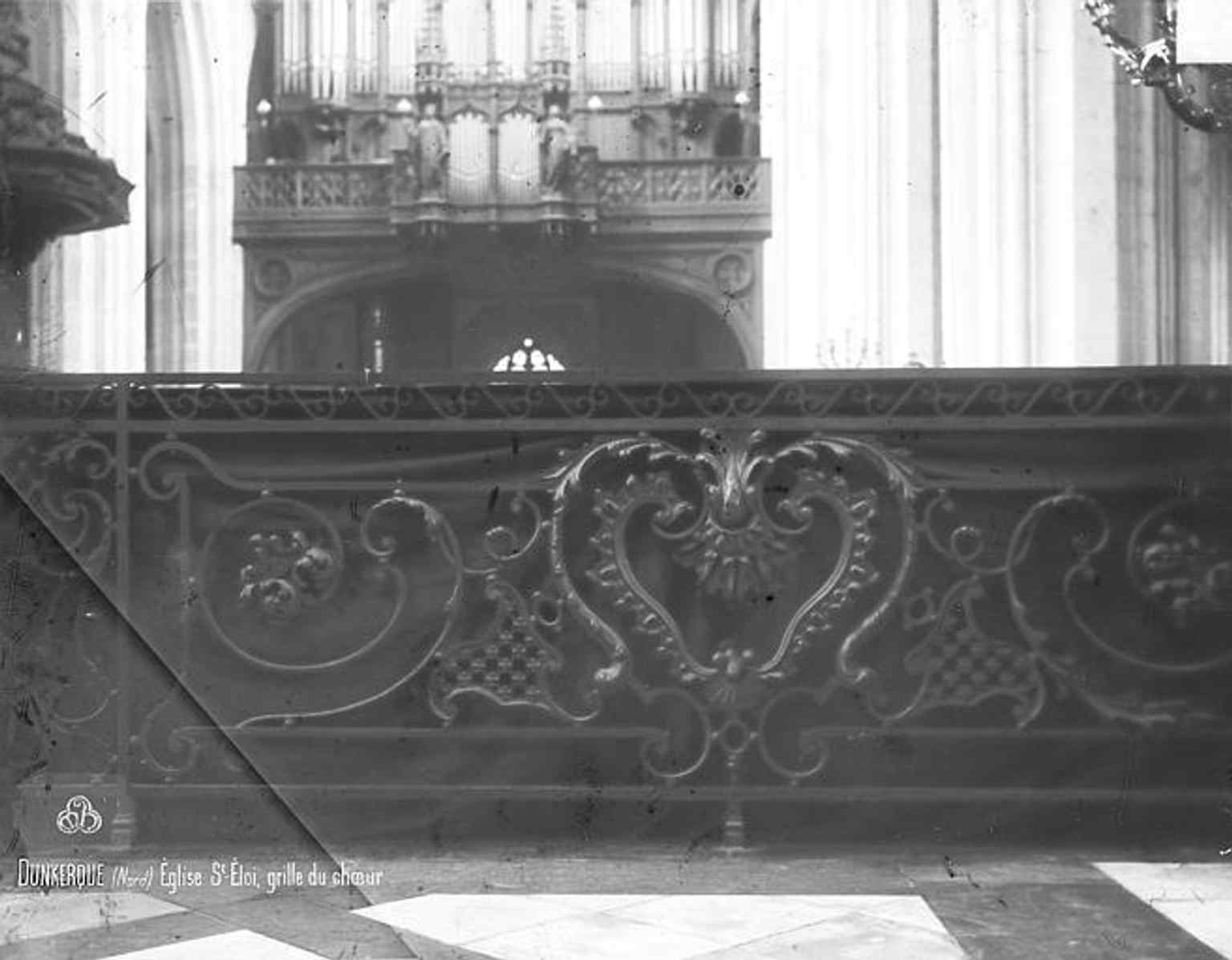 A close look at the choir grille inside Saint-Éloi, part of the church’s restored interior furnishings after most pre-1940 furniture was lost.