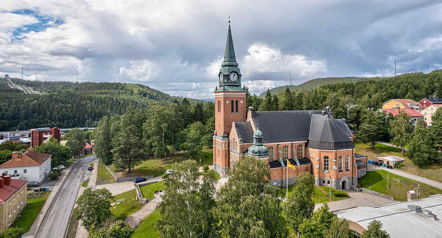 Aerial perspective highlighting the church’s roof and plan, giving context to the 20th-century building in Örnsköldsvik.