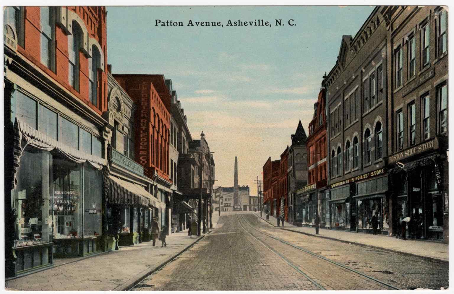 Patton Avenue in the early 1900s, where the Vance Monument appears in the distance as an icon of downtown Asheville.