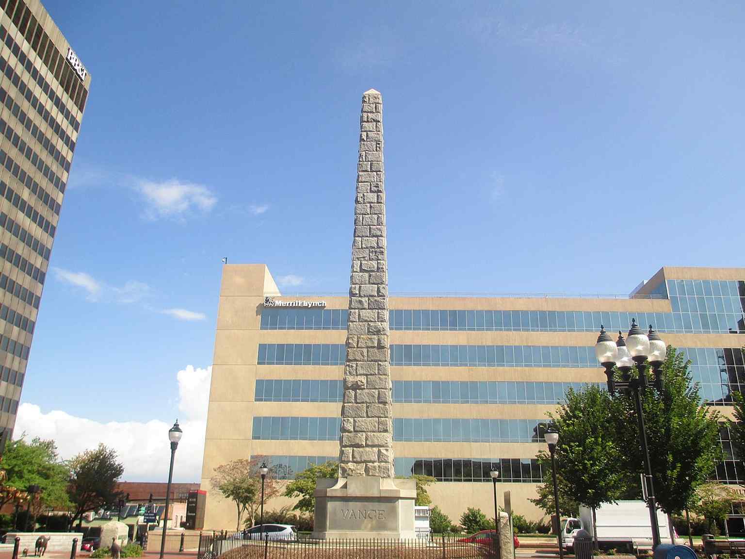 A clear full-height view of the granite obelisk, echoing Richard Sharp Smith’s Washington Monument-inspired design.