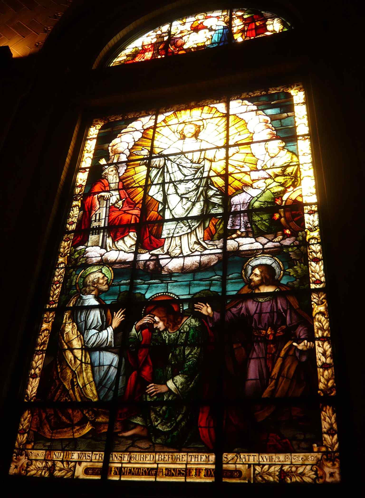 A stained-glass window of the Transfiguration of Christ, one of the basilica’s elaborate Munich-made windows.