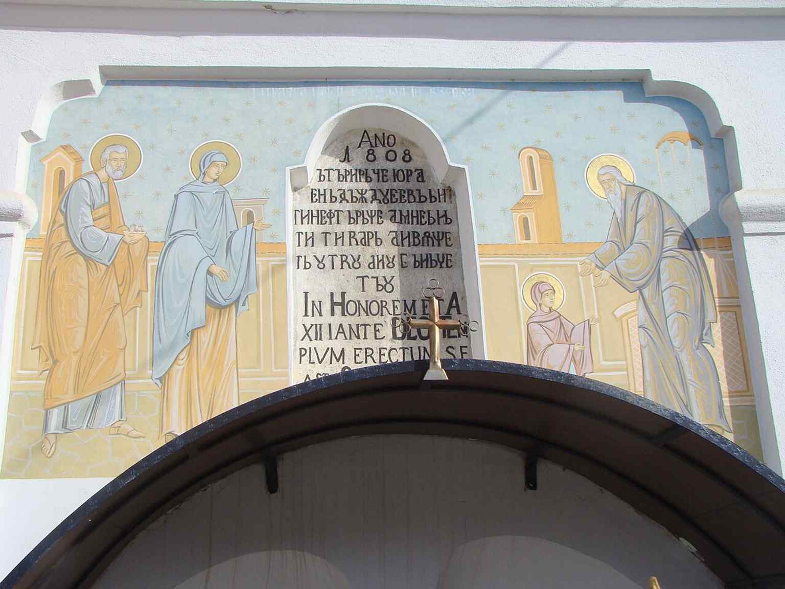 An exterior view of the church, showing its setting in the Cornești suburb, historically the area where Orthodox Romanians were marginalized and built this stone structure as a symbol of defiance.