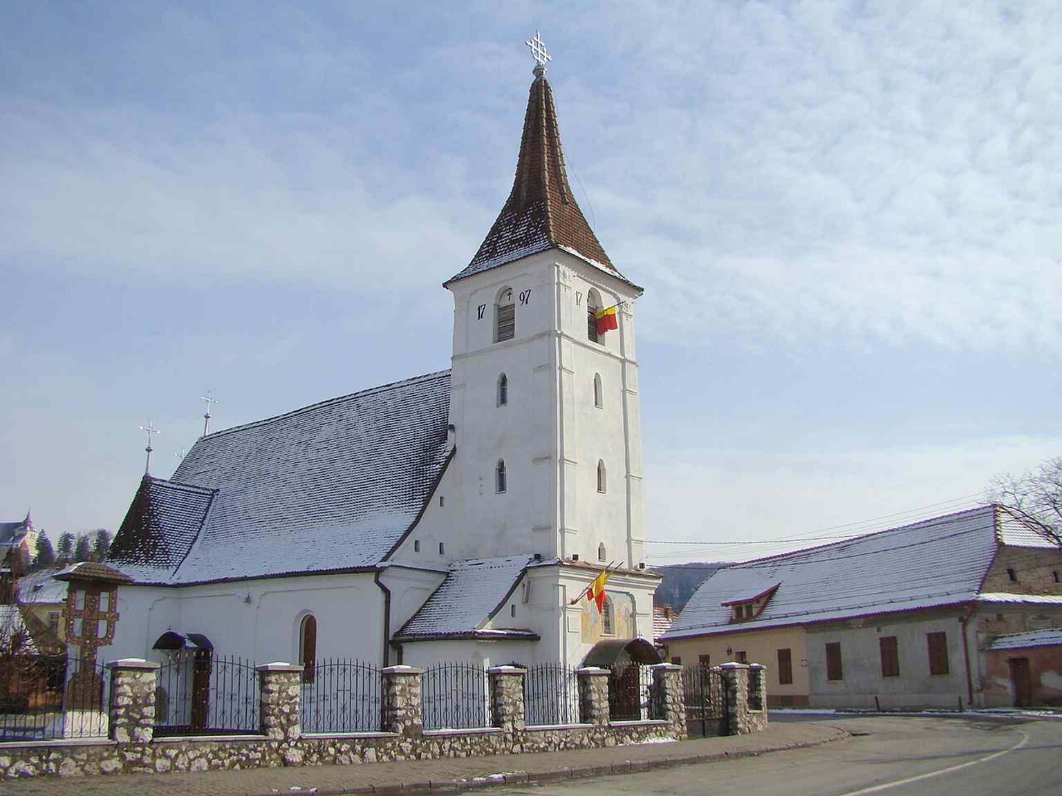 A close-up of the church's entrance, featuring the inscription placed above it in 1805, a significant step in the church's construction.