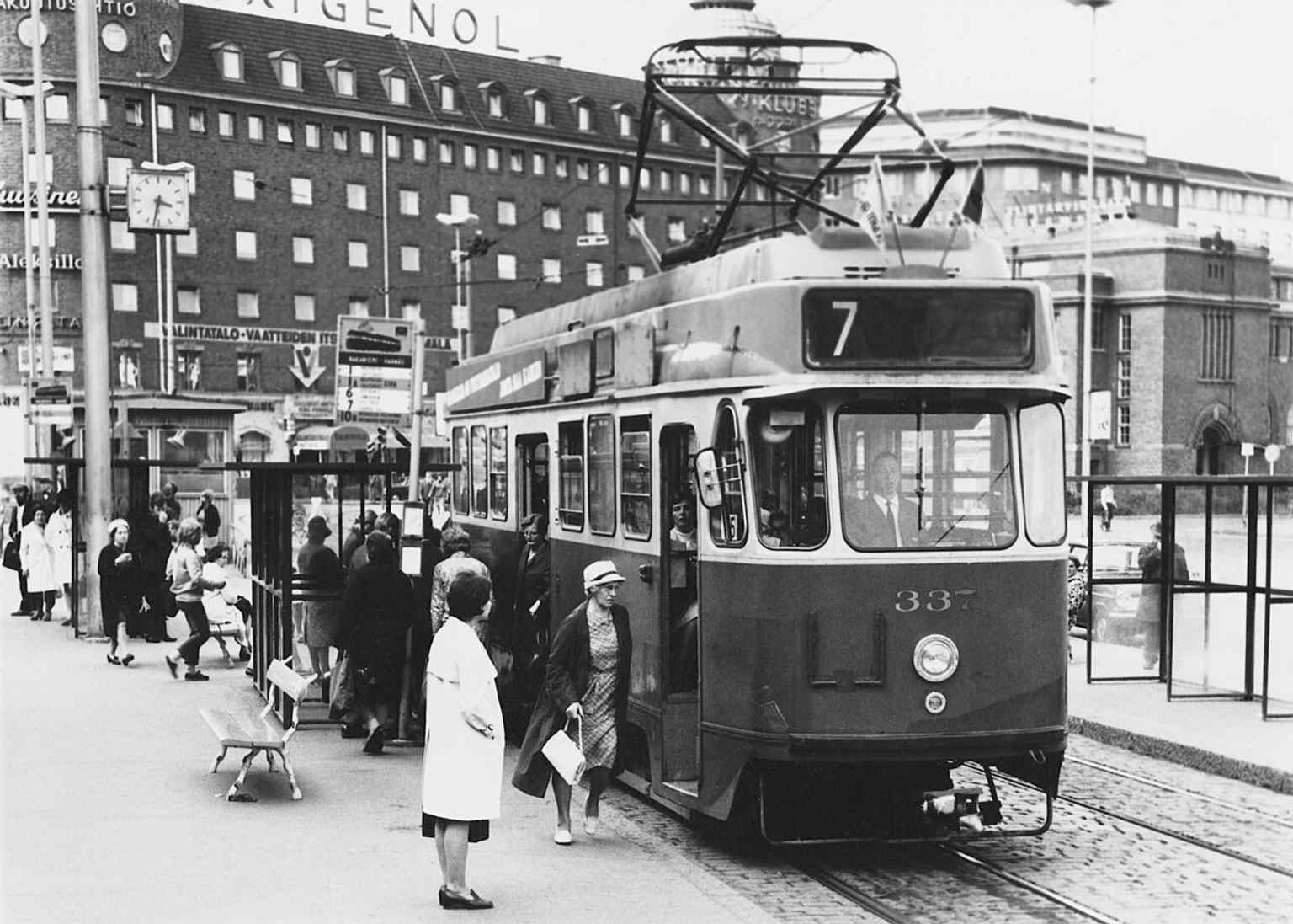 A tram on Hakaniementori, echoing the story of Hakaniemi as a long-time tram and bus hub.