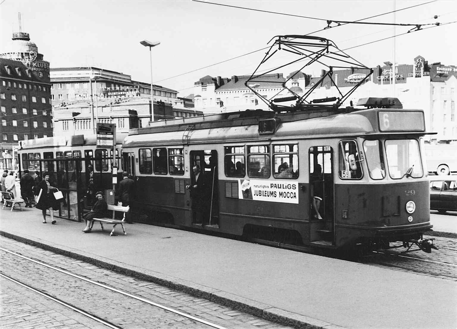 A 1961 tram on the square, capturing Hakaniemi before the metro era and before the area’s later redevelopment.