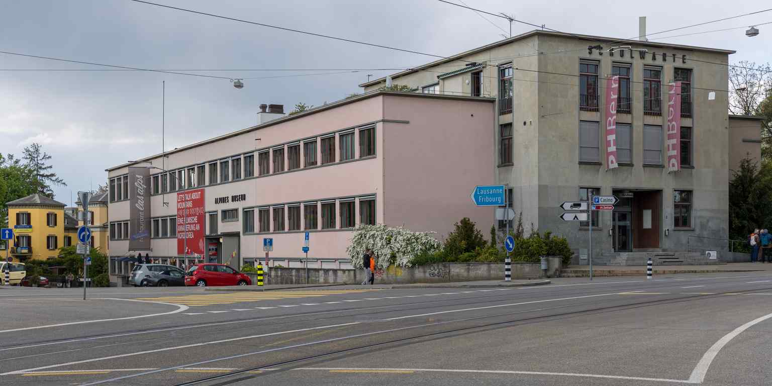 A contextual view of the embassy within Bern's prestigious Kirchenfeld district, once a neighborhood for aristocrats and high-society gatherings, now a hub for critical diplomatic work.