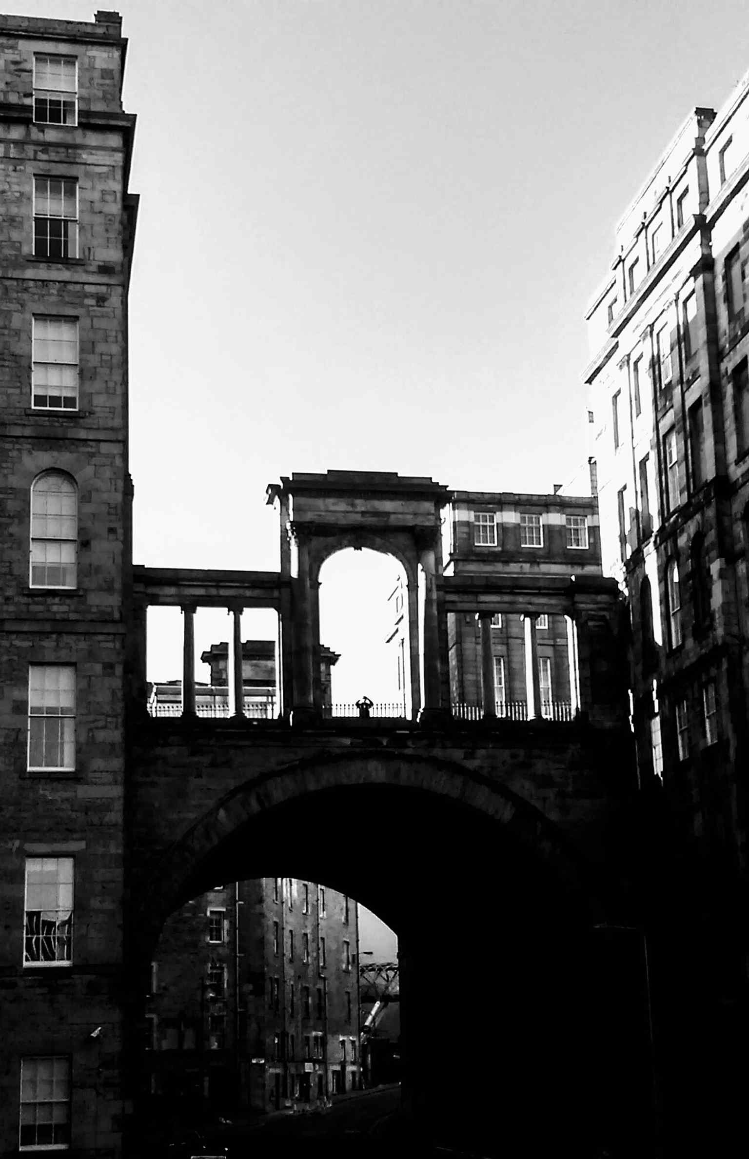 A clear view of Regent Bridge from Waverley station, showing the road bridge that carries the A1 into Edinburgh’s New Town beside Calton Hill.