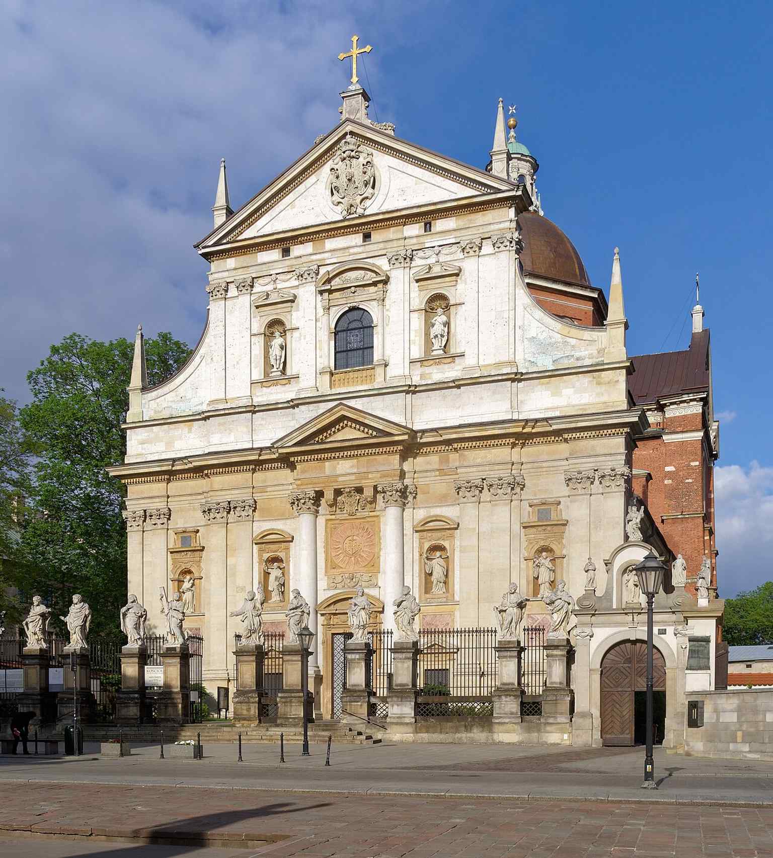 A clear modern view of the church’s Baroque façade — the first Baroque church in Kraków, founded by King Sigismund III Vasa for the Jesuits.