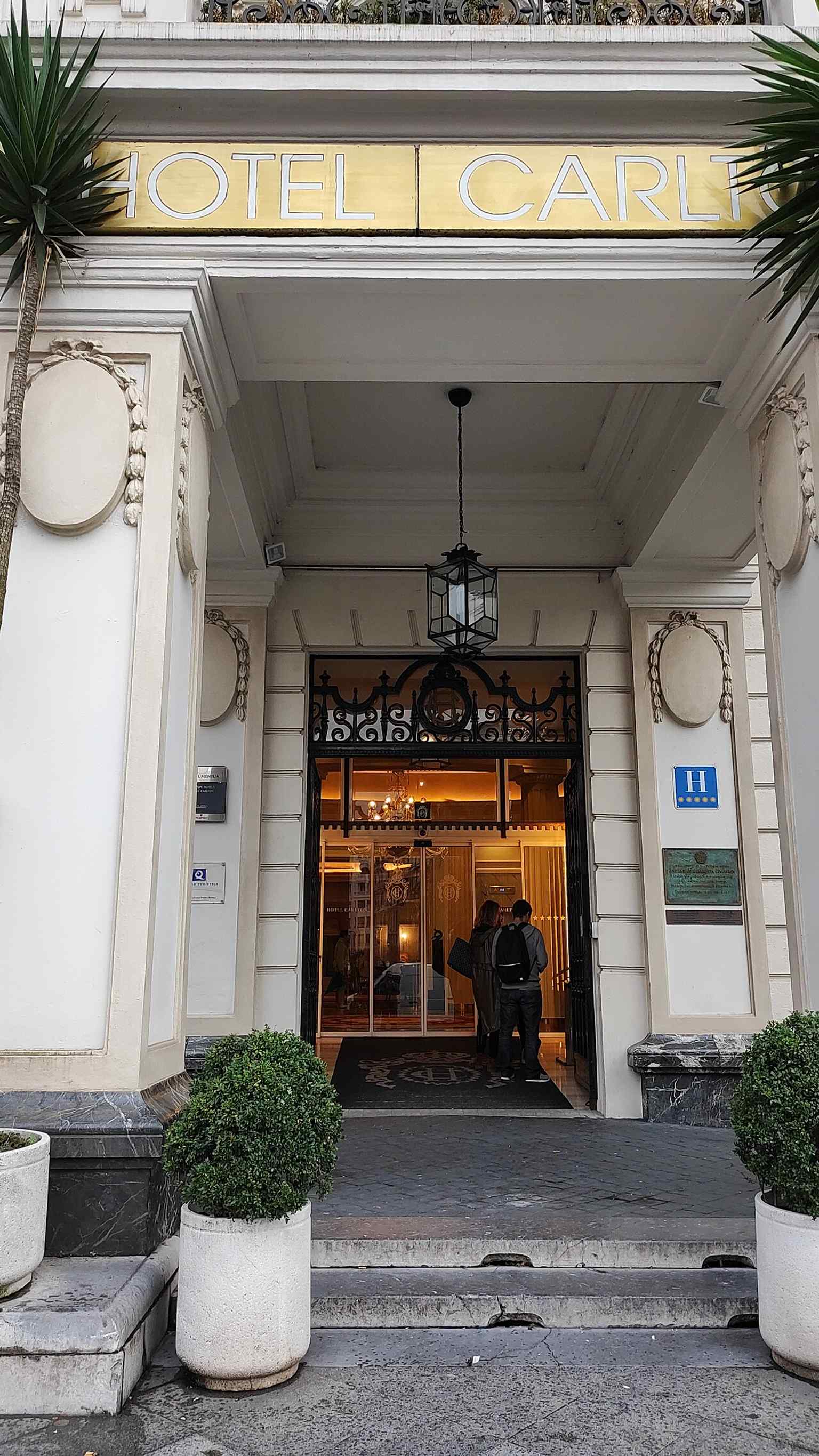 Hotel Carlton fronts Moyúa, one of the plaza’s landmark façades and a key part of the elegant urban ensemble around the square.