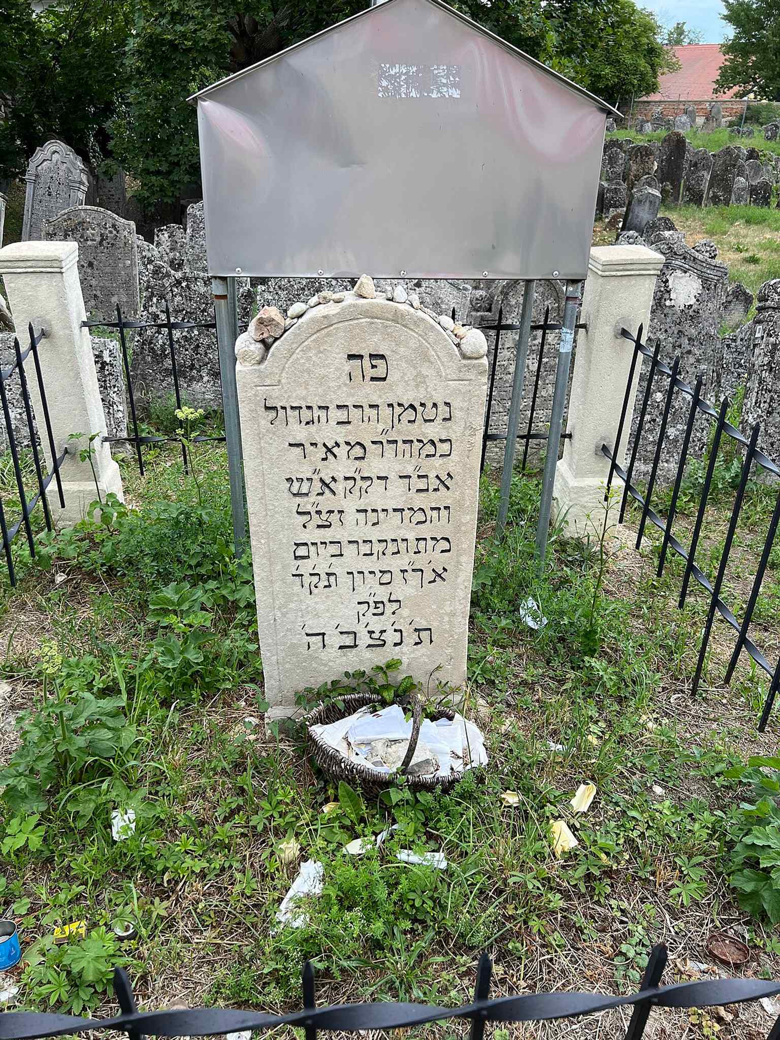 A close look at a gravestone in the cemetery, representative of the Hebrew inscriptions that researchers have catalogued and transcribed.