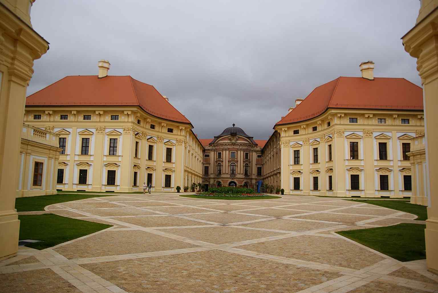 An expansive view of Slavkov Castle, one of Moravia's most magnificent Baroque castles, known as the residence of the Kounic family.
