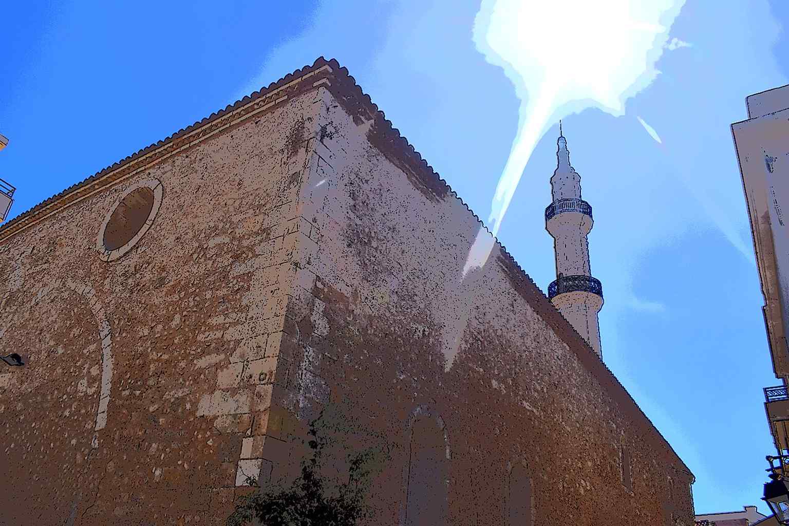 A distinct side view of the Neradje Mosque, clearly showing the cluster of three semicircular domes that define its roofline.