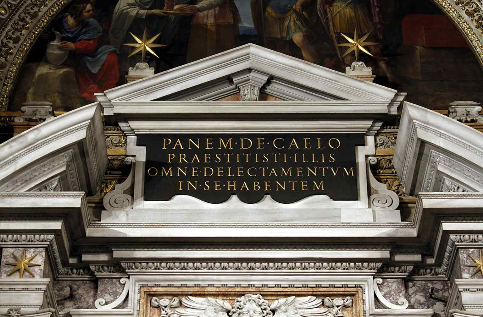 A close detail from the Aldobrandini Chapel altar, useful for the marble and sculptural richness of the interior.