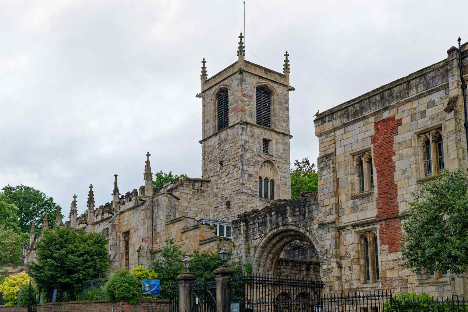 The peaceful grounds surrounding Saint Olave's Church today, inviting visitors to explore the deep, complex history hidden within its yard (2024).