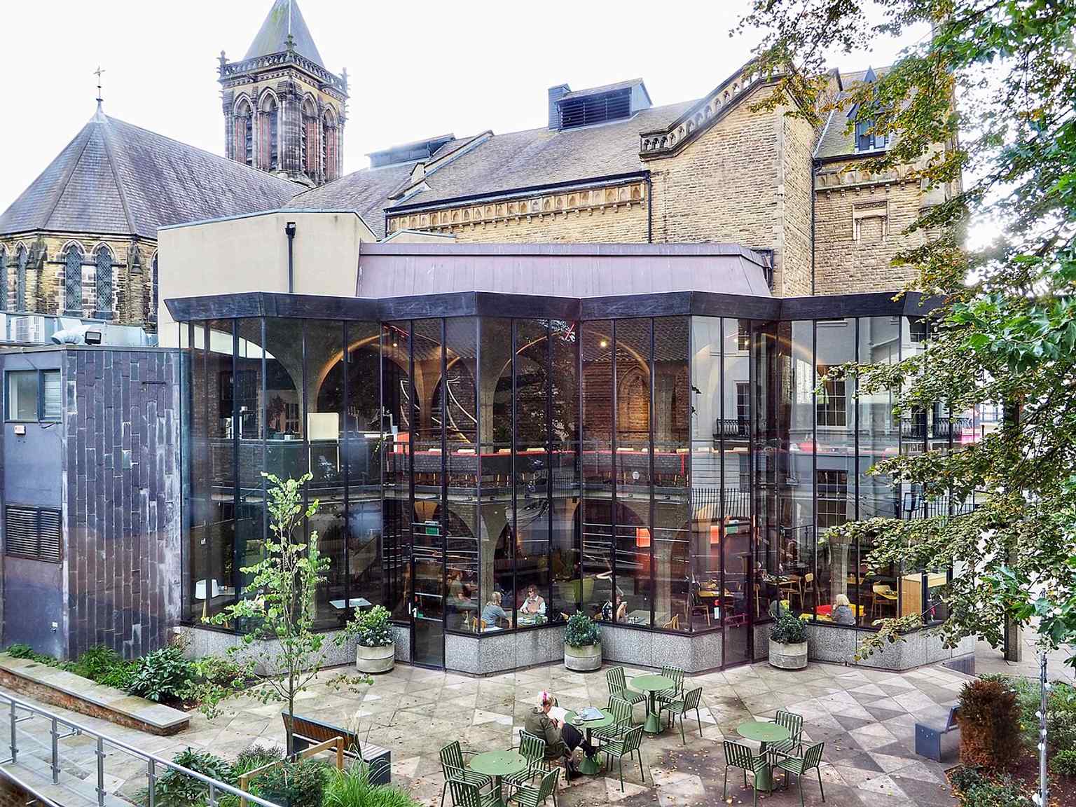 Patrick Gwynne’s 1967 extension, with its concrete parasols and glass wall, shows the modernist foyer added in a major postwar redevelopment.