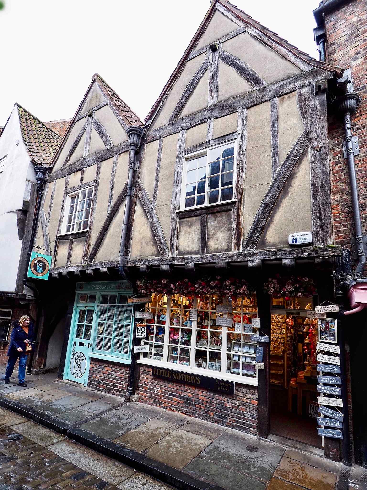 Another angle on the same historic frontage, useful for showing how the two adjoining buildings read as one layered heritage pair.