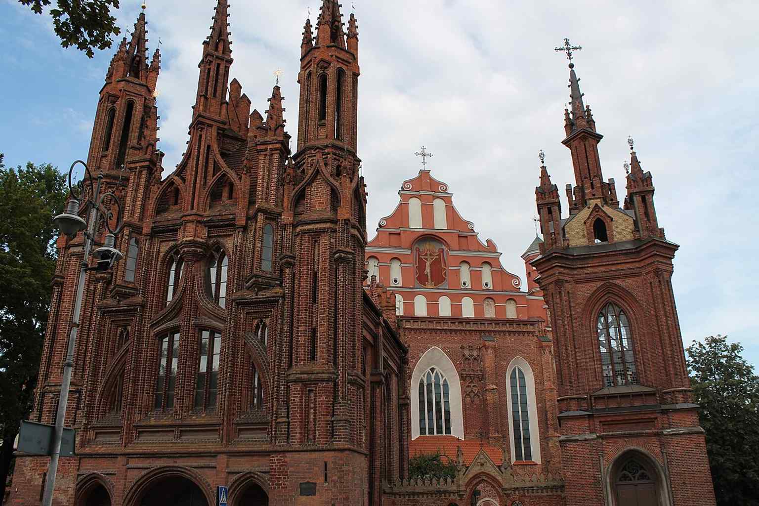 A close look at the façade’s red brick patterns and pointed arches, showing why St. Anne’s is celebrated as a masterpiece of Brick Gothic.
