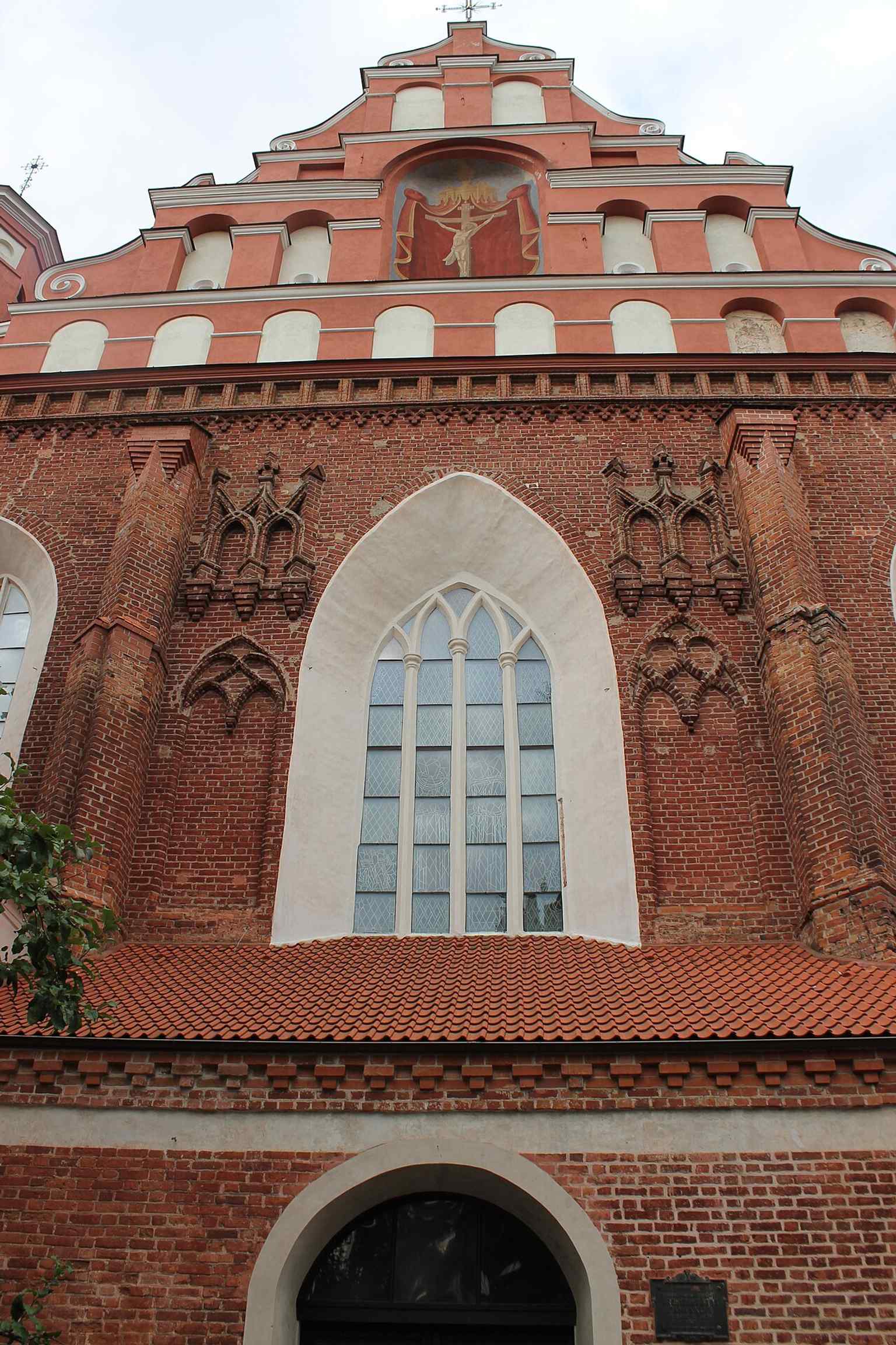A sharply framed façade shot that highlights the church’s symmetrical front and intricate Gothic detailing in the Old Town setting.