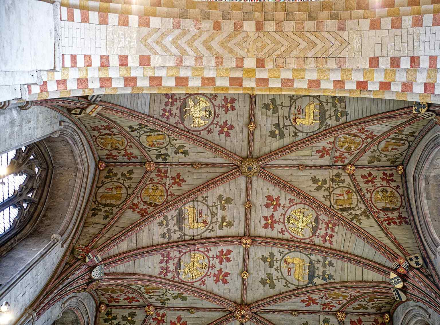 Another long nave perspective, useful for conveying the cathedral’s immense length and its mix of Norman and later Gothic arches.