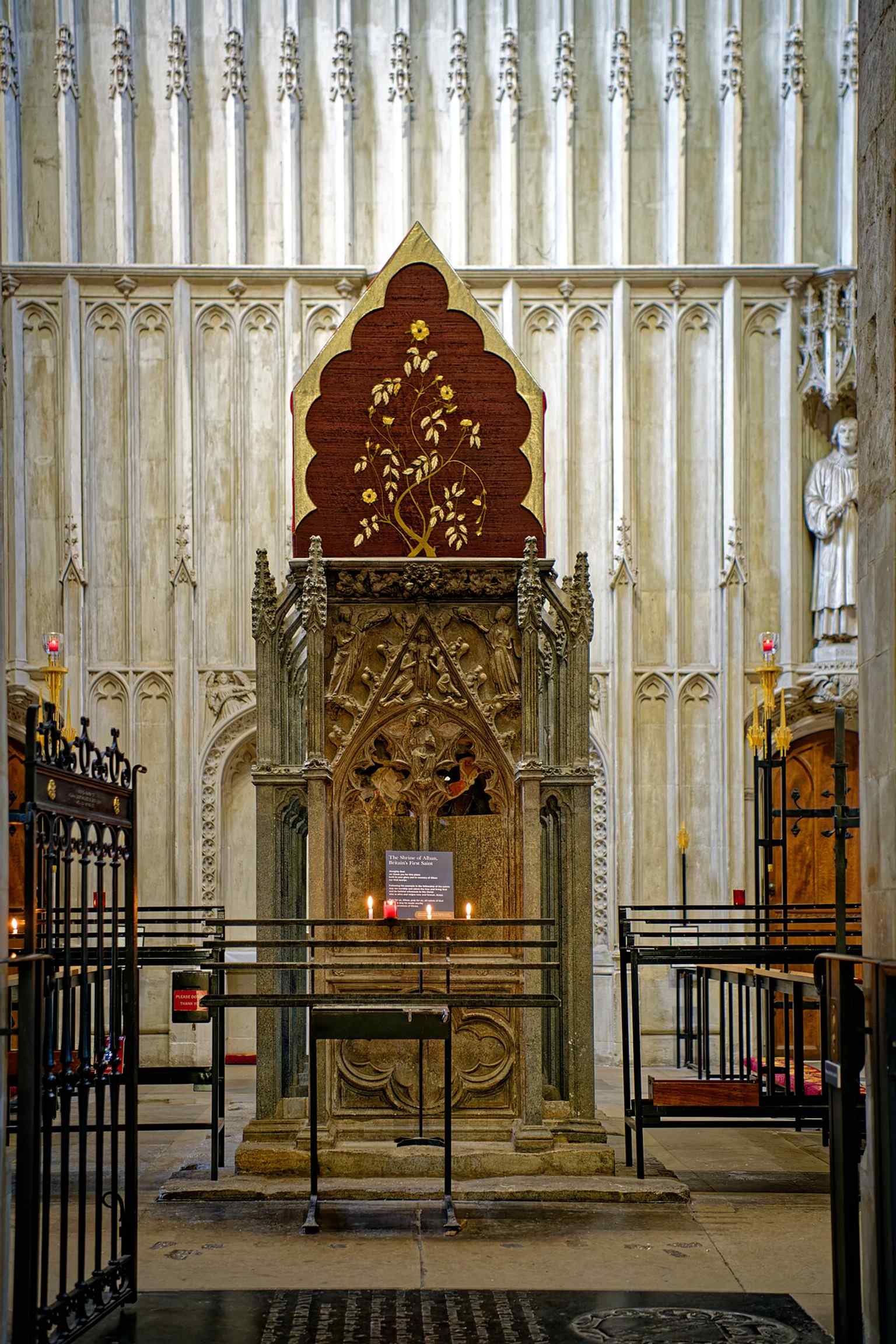 The chancel ceiling, part of the richly restored east end that reflects centuries of repair after medieval damage and Victorian intervention.
