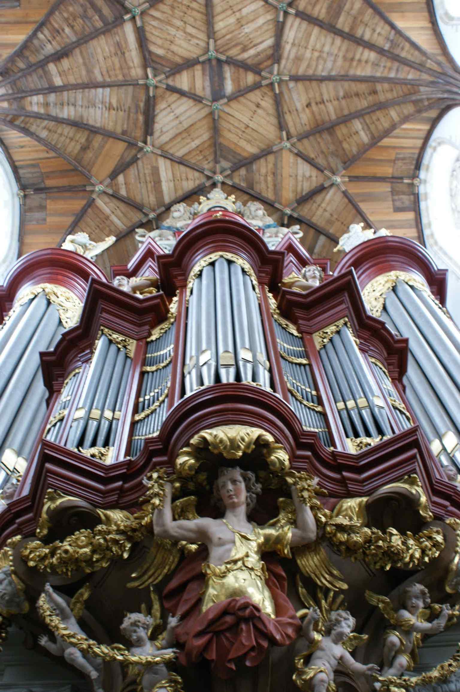The choir stalls inside the church, part of the historic interior that was repeatedly rebuilt and restored.