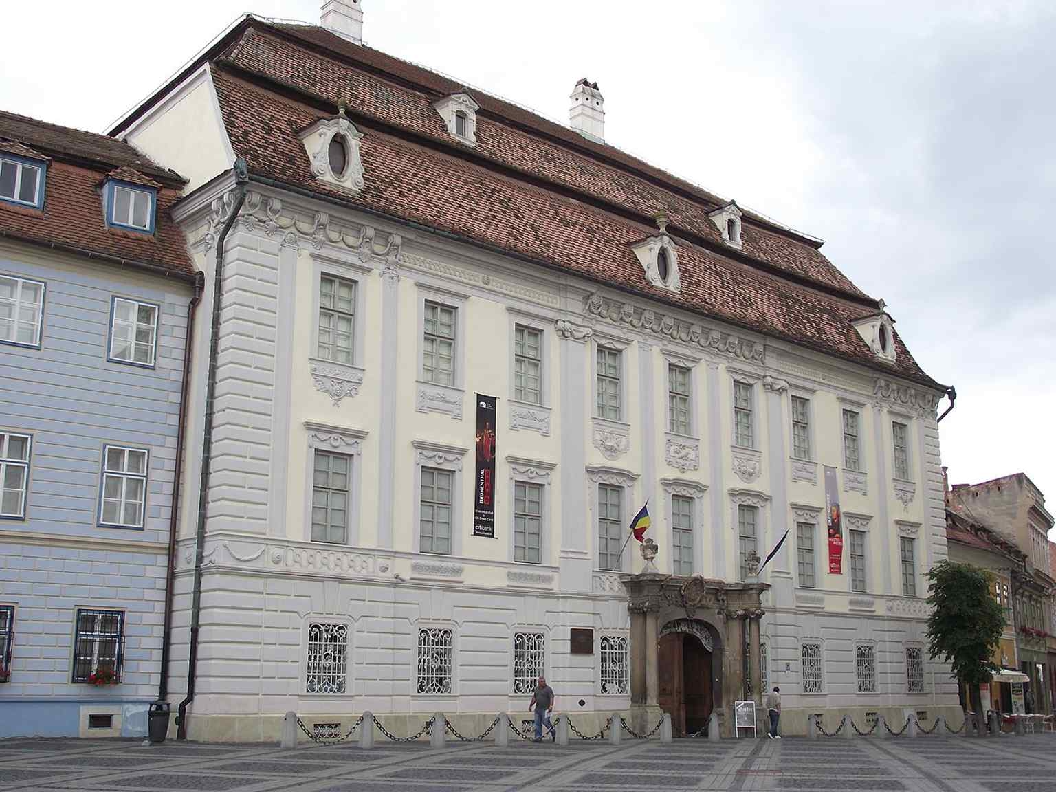 Gaze upon the grand facade of the Brukenthal Palace, home to the museum which officially opened to the public in 1817, making it Romania's oldest.