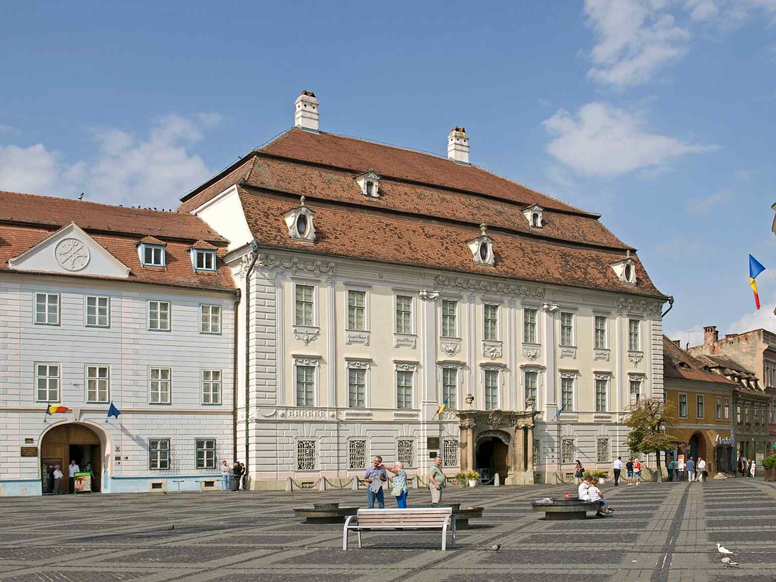 Witness the prominent location of Brukenthal Palace and the Blue House in Sibiu's historic center, part of Baron Brukenthal's original city palace complex.