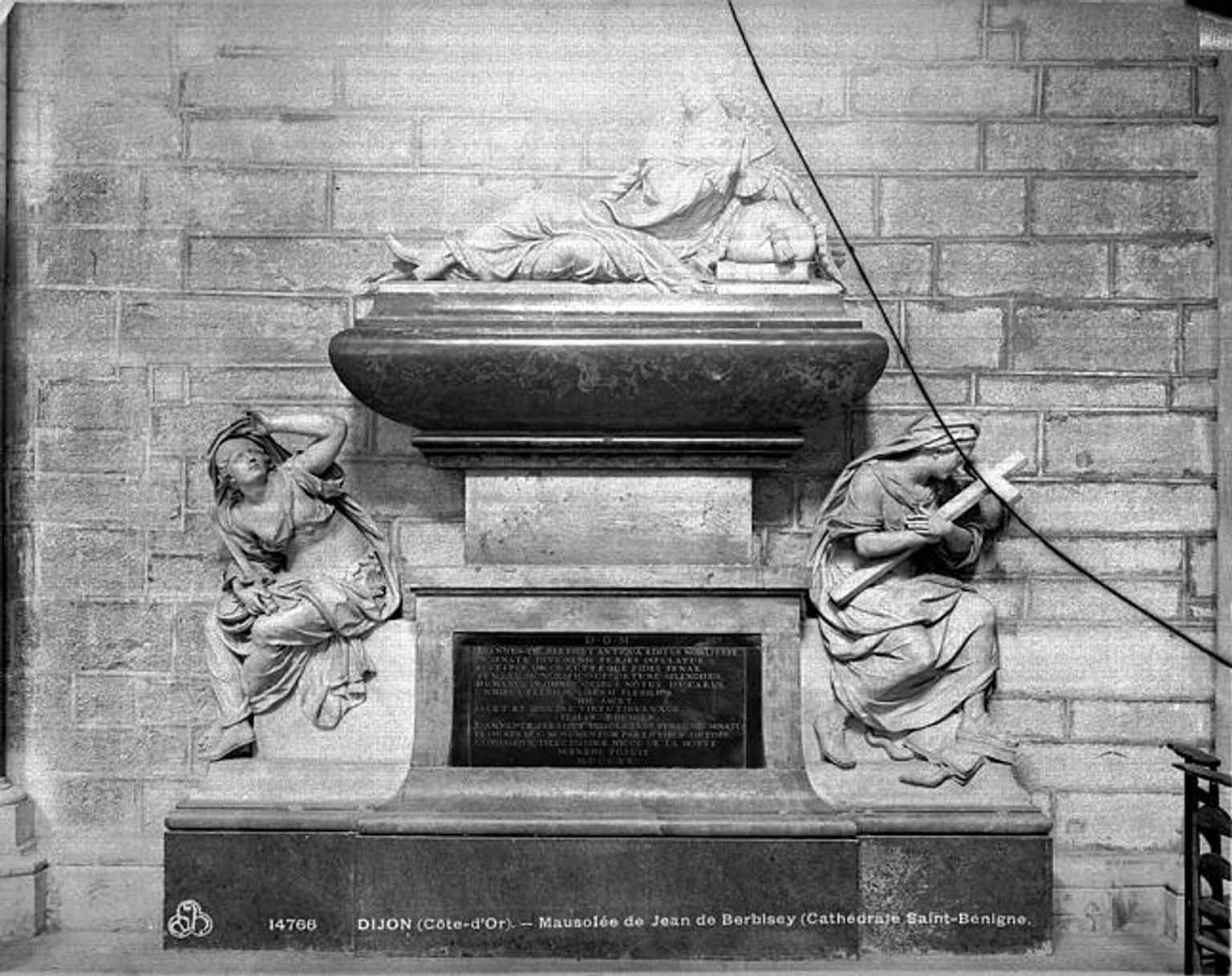 The mausoleum of Jean de Berbisey, a notable tomb located within the nave of the cathedral, part of the several burials found there.