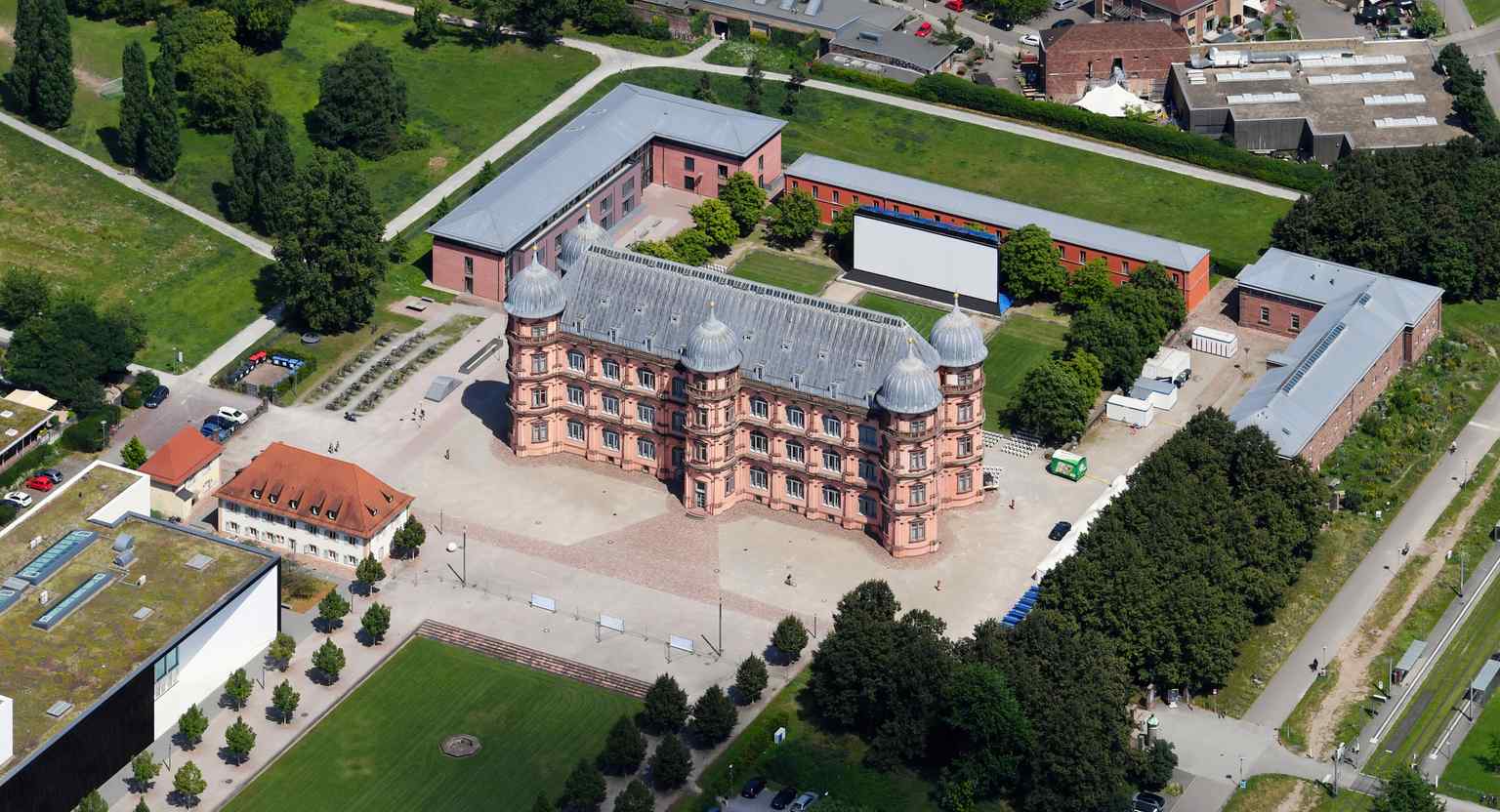 An aerial view from the southwest shows the extensive grounds of Schloss Gottesaue, built on the site of a former Benedictine abbey and extensively rebuilt after its destruction in 1944.