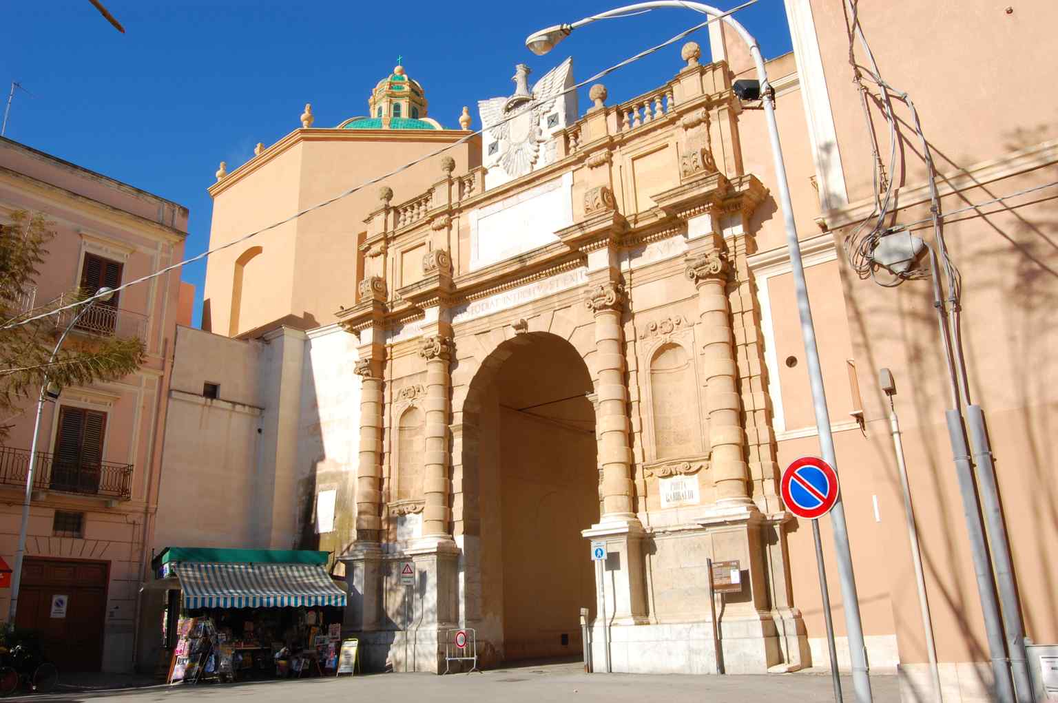 This view of Porta Garibaldi before its 2018 restoration shows an old niche, which once might have housed a statue, embodying the gate's long history and continuous evolution.