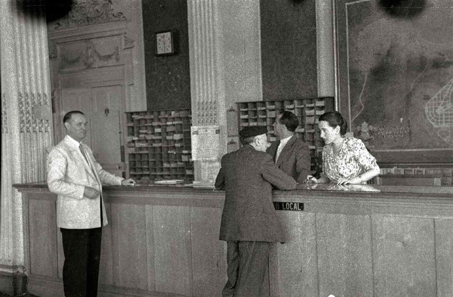 Postwar tourism offices in the theatre’s lower level, a reminder of its changing uses beyond performances.