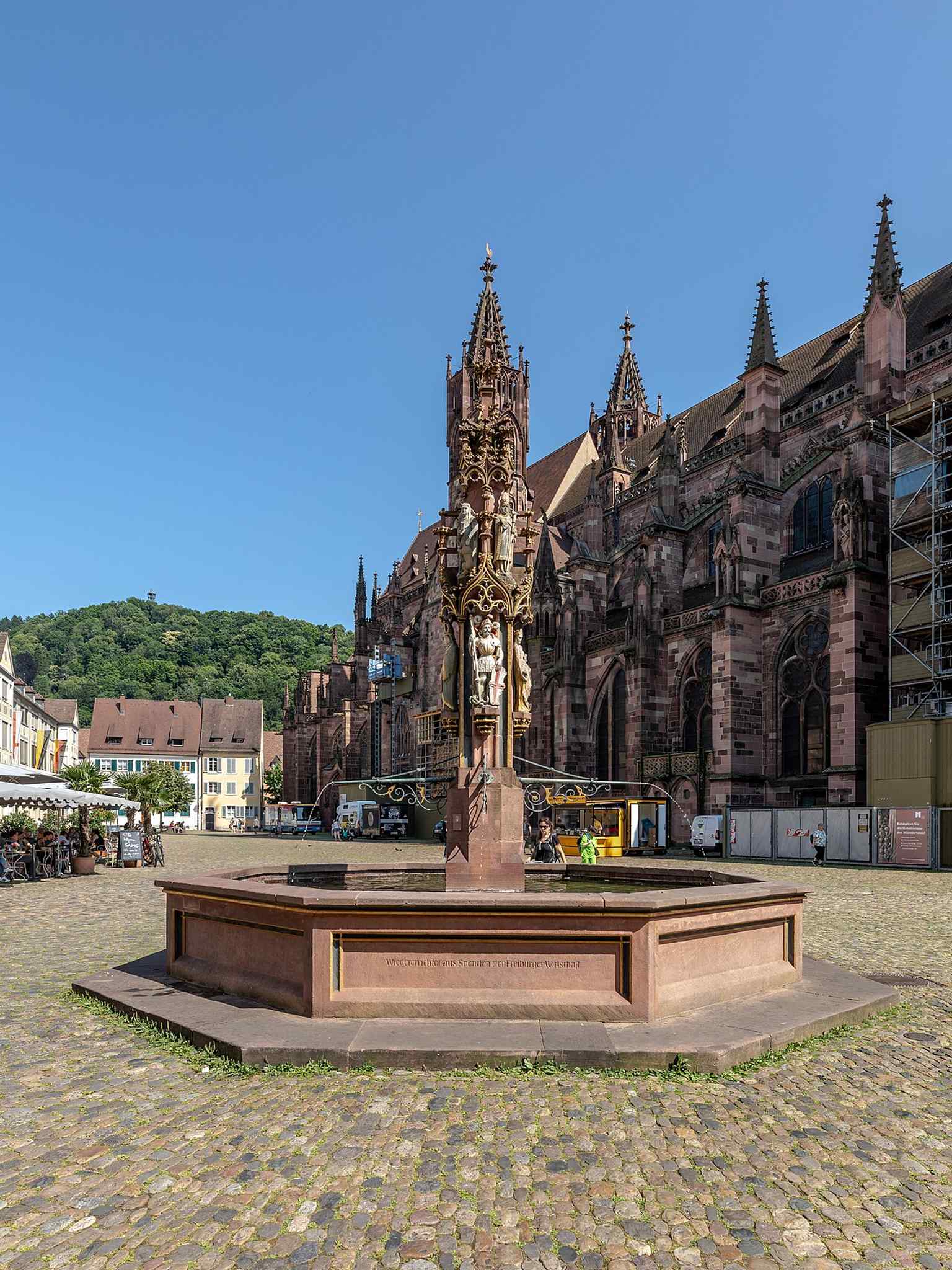 A close view of the Fischbrunnen, the reconstructed market fountain that once served as a center for fish sales on the Münsterplatz.