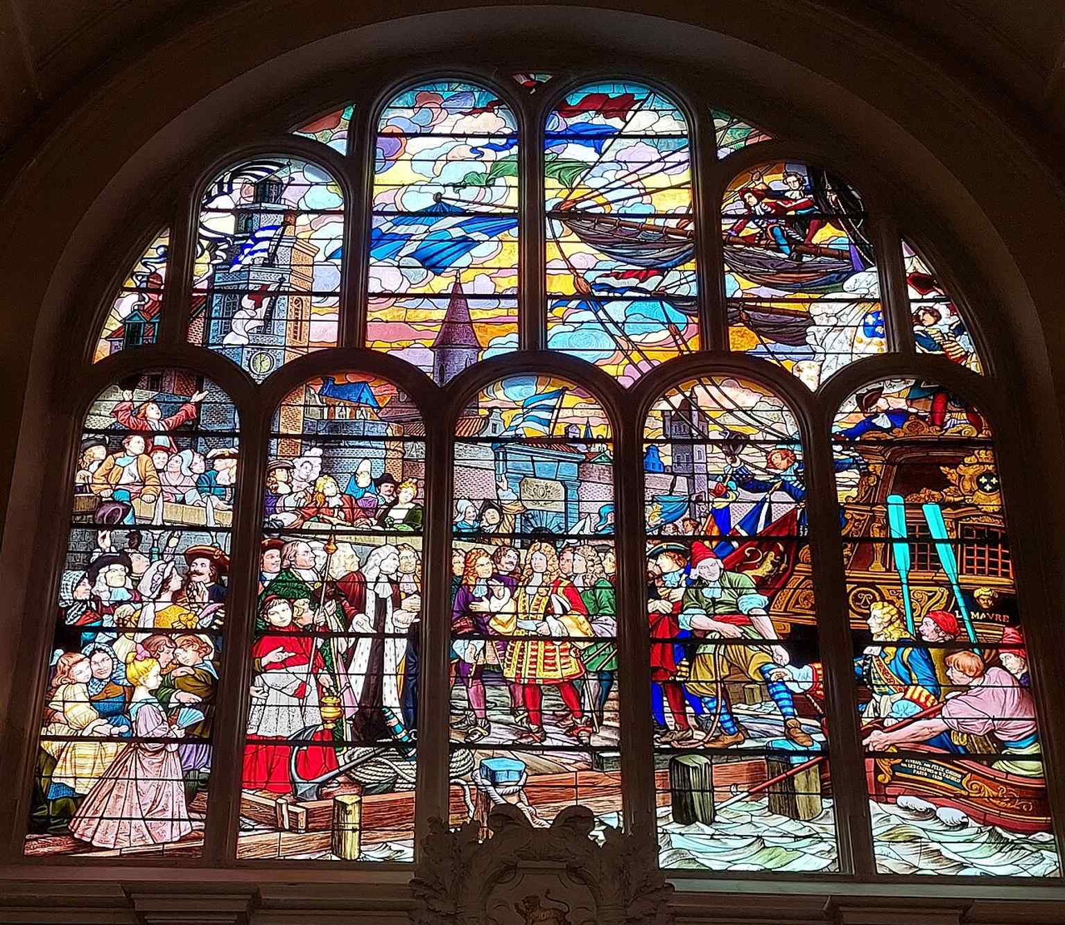 Jean Bart on a stained-glass panel by Félix Gaudin, linking the town hall interior to Dunkirk’s maritime history.