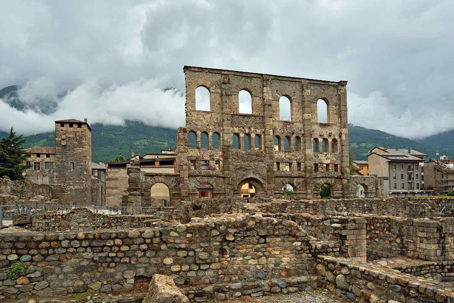 An interior view revealing the remains of the 'cavea,' the ancient seating area designed to accommodate 3,500 to 4,000 spectators.