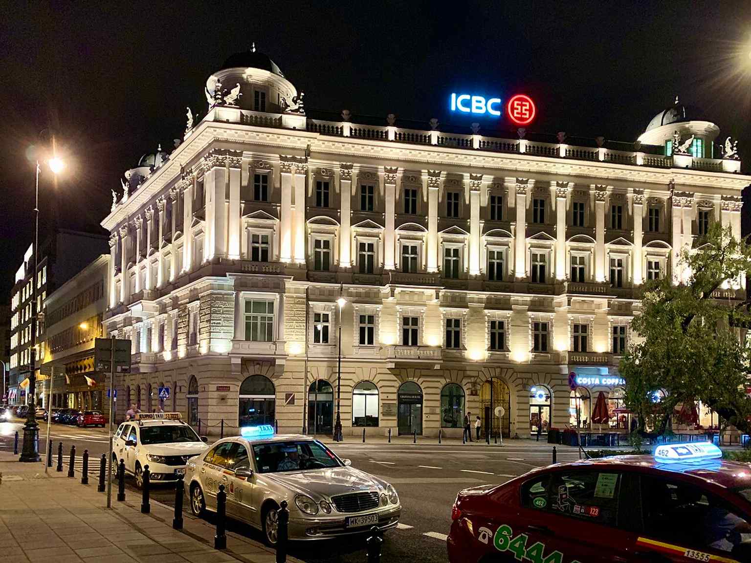 A recent full view of the restored tenement, showing its present-day office-building role in central Warsaw.
