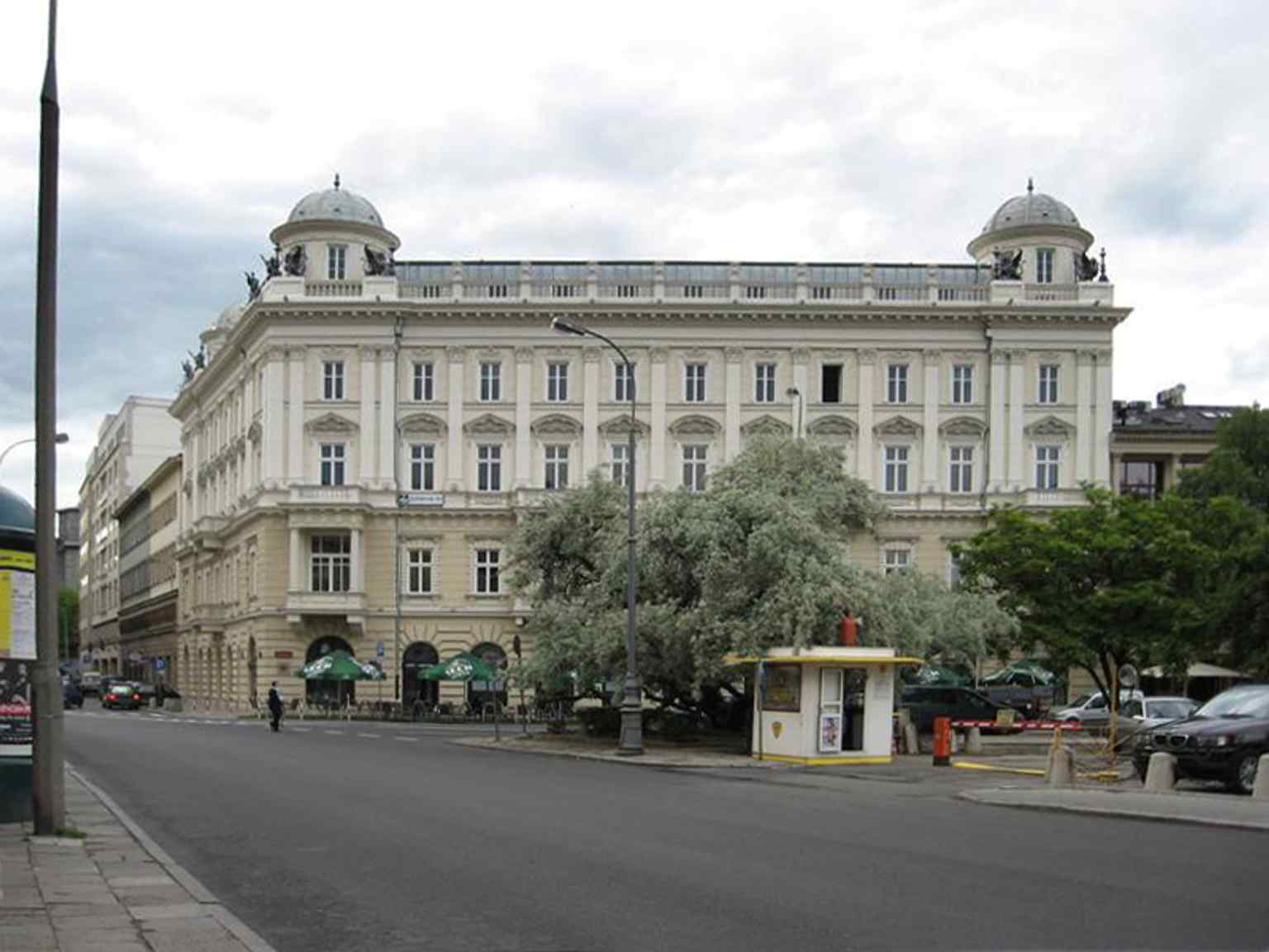 The restored corner tenement in 2006, showing how the lost domes and griffins returned to the skyline.