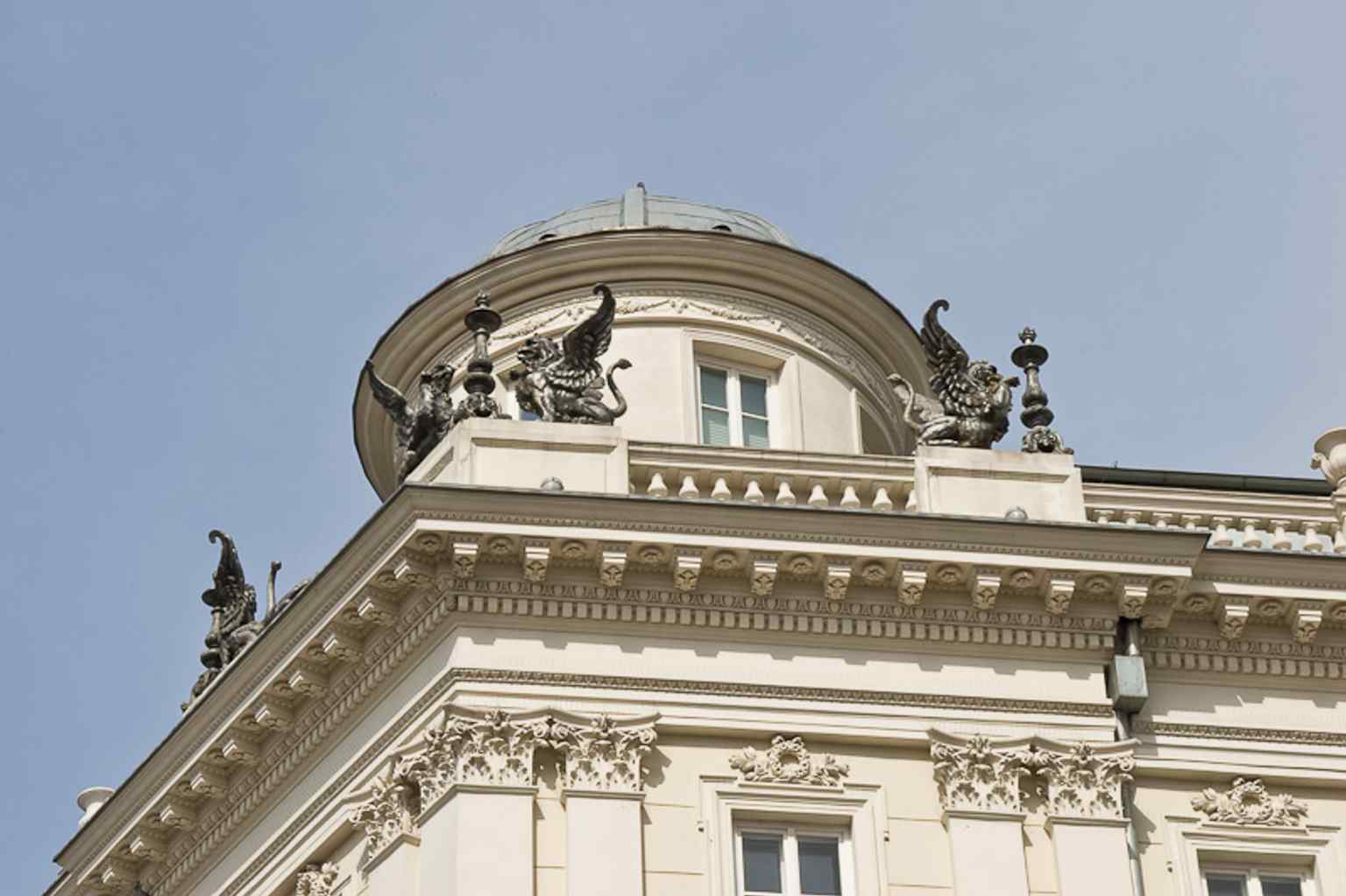 A close-up of the griffins that gave the house its name — a deliberate reference in Huss’s decorative design.