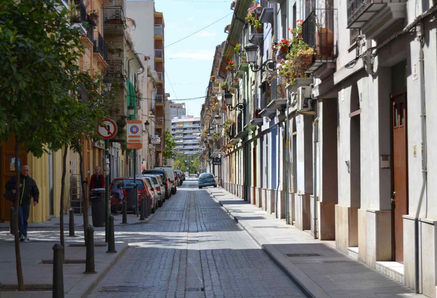 The tight confines and wrought-iron balconies of the street, which the massive Fallas monuments eventually outgrew (2013).