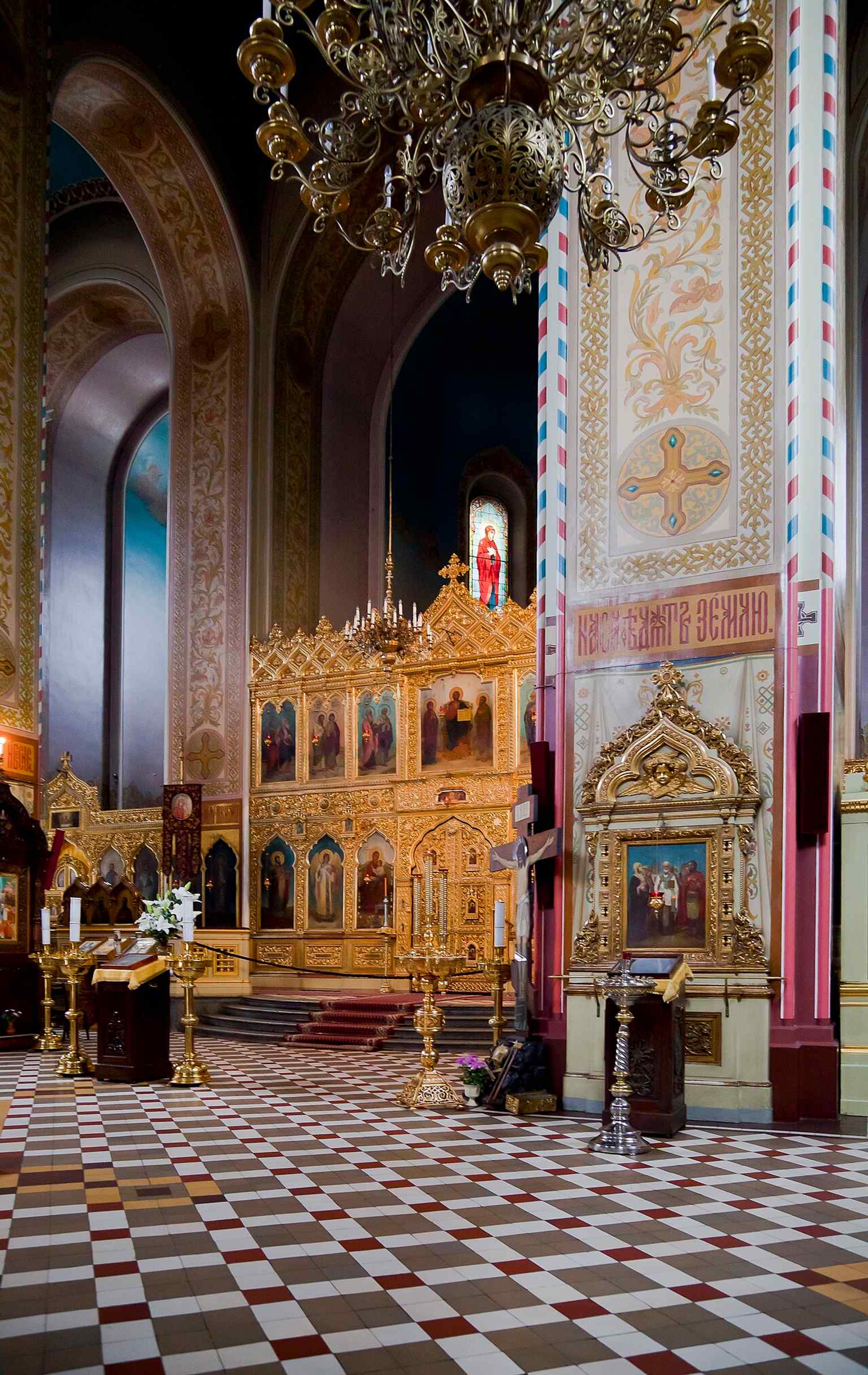 Another interior angle showing the decorated worship space, where the cathedral continued to serve the Russian parish after 1945.
