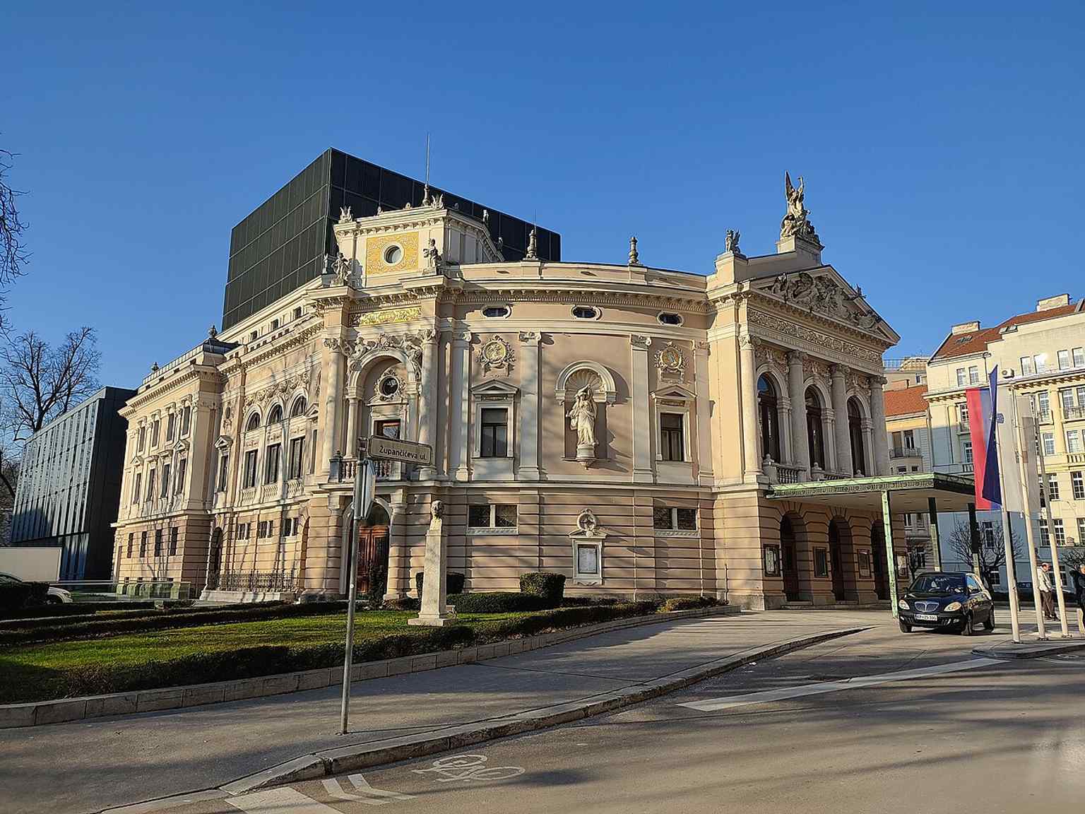 The Ljubljana Opera House as it stands today, after its extensive 1998-2011 renovation. The project, though marred by delays and controversy, significantly expanded the building and added a modernist annex to the rear.
