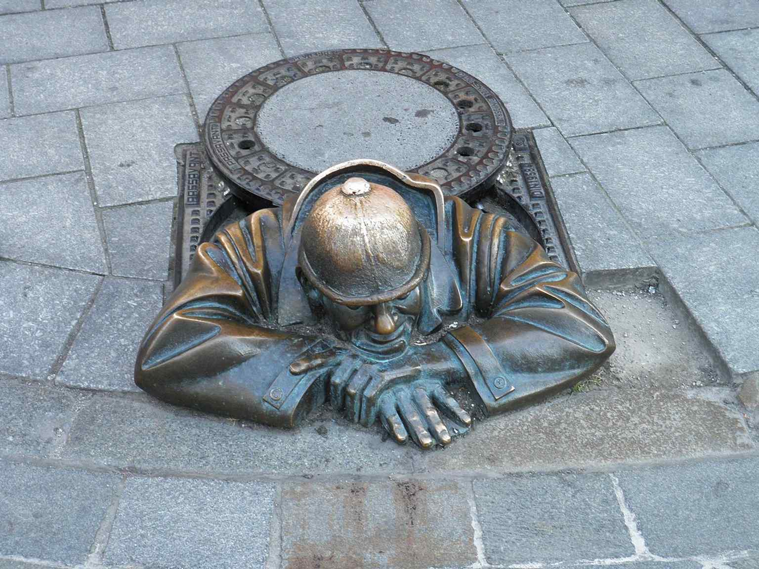 A closer look at Čumil’s head and cap, the part tourists often touch for good luck.