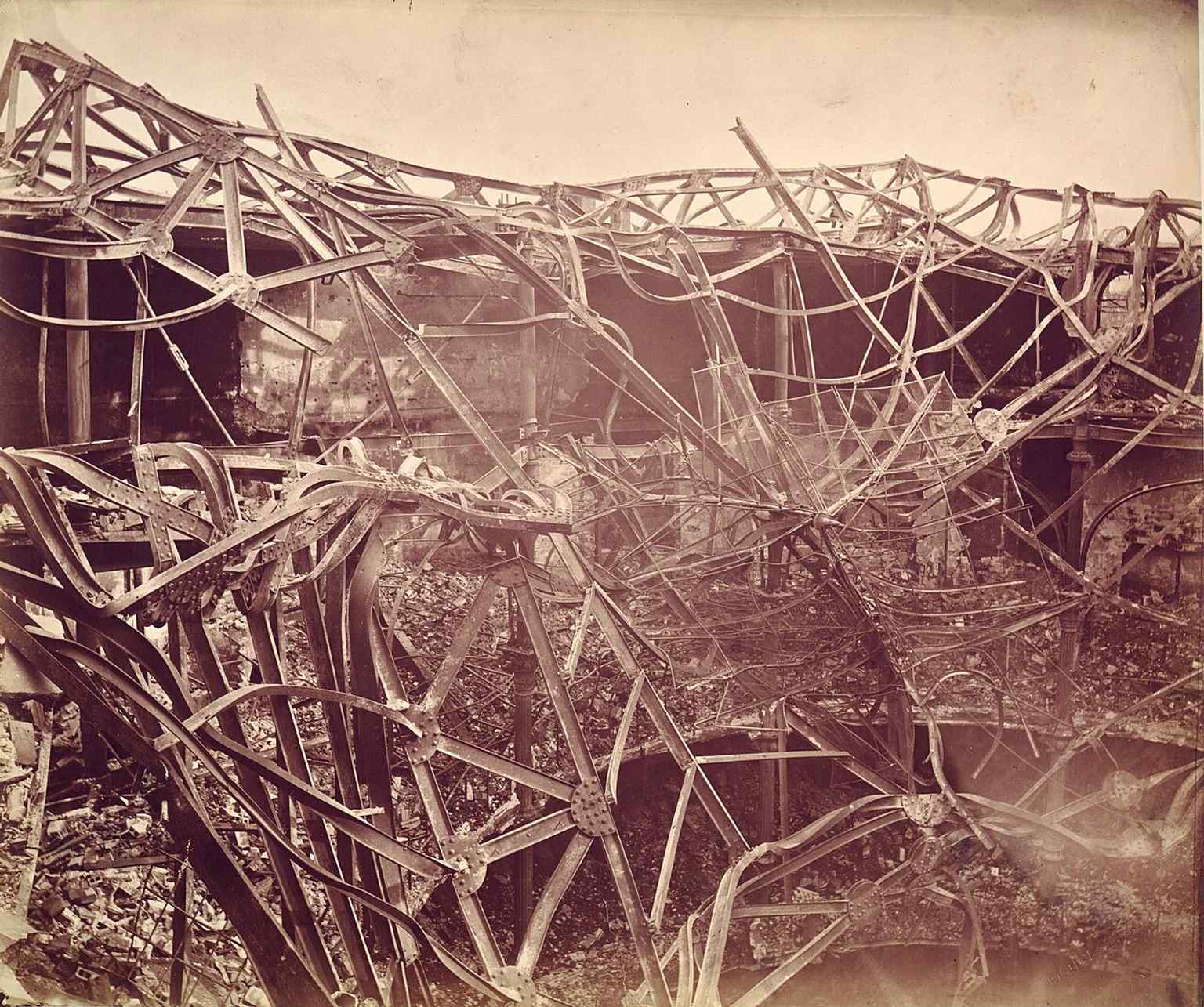 The theatre after the 1880 fire — evidence of the repeated disasters that shaped its history.