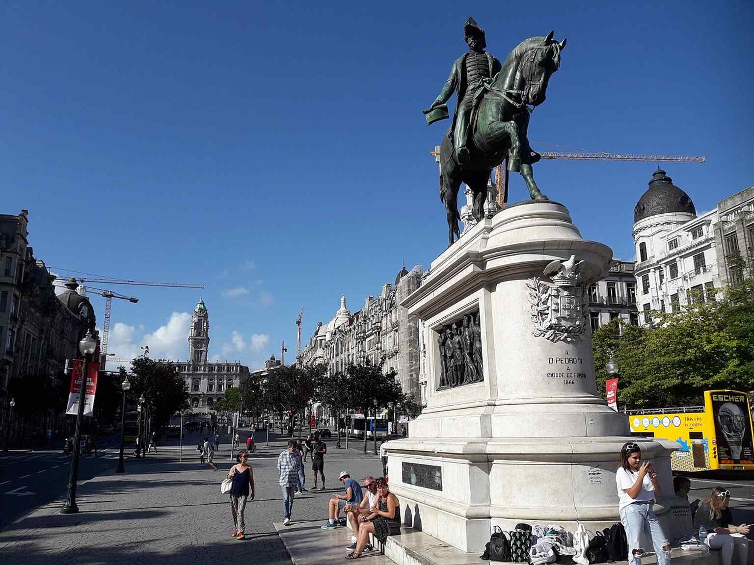 The statue of D. Pedro IV marks the square at the lower end of Avenida dos Aliados, where the city’s monumental center begins.