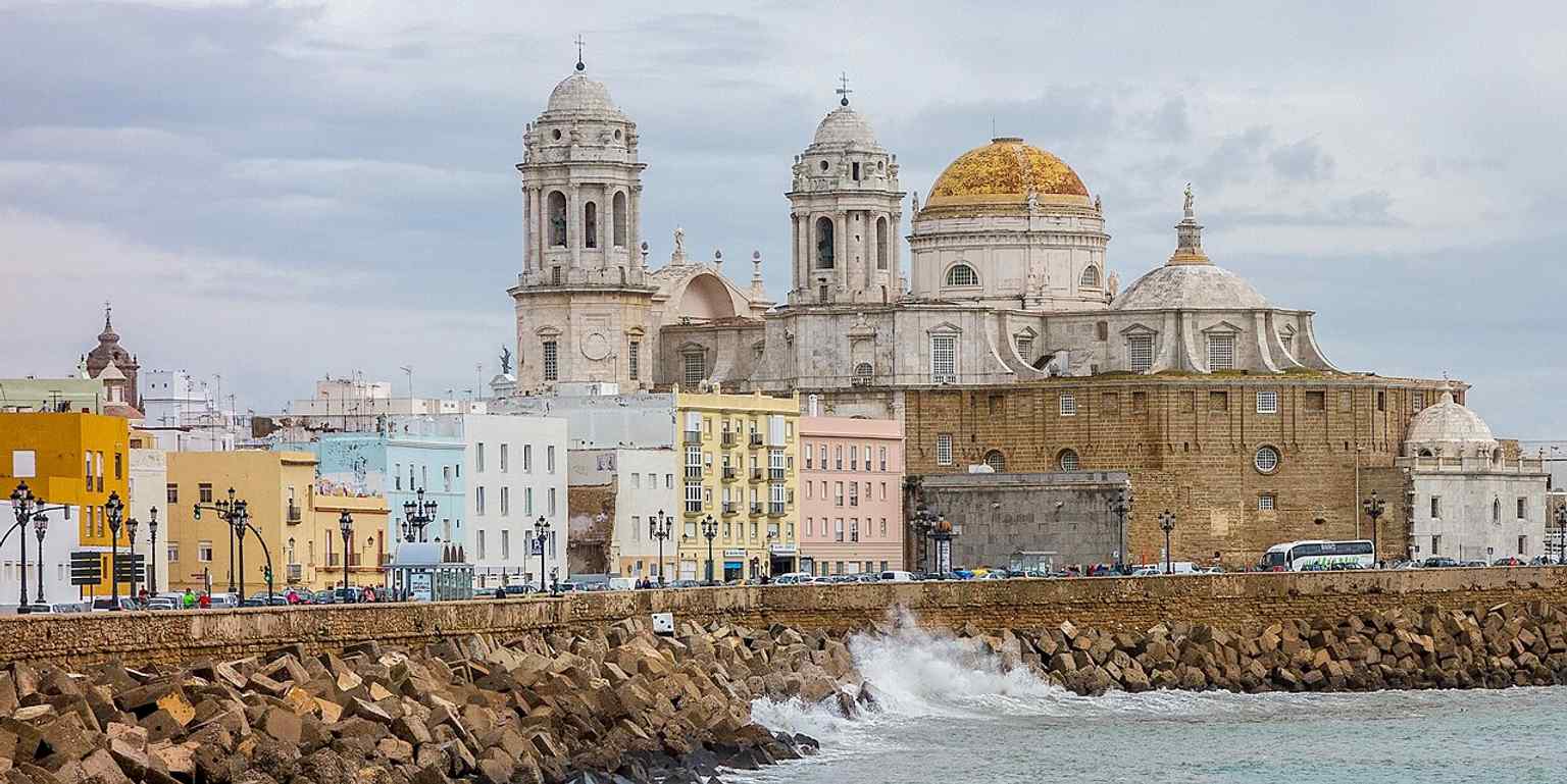 The cathedral viewed from the quay, emphasizing how closely this landmark rises above the waterfront and city promenade.
