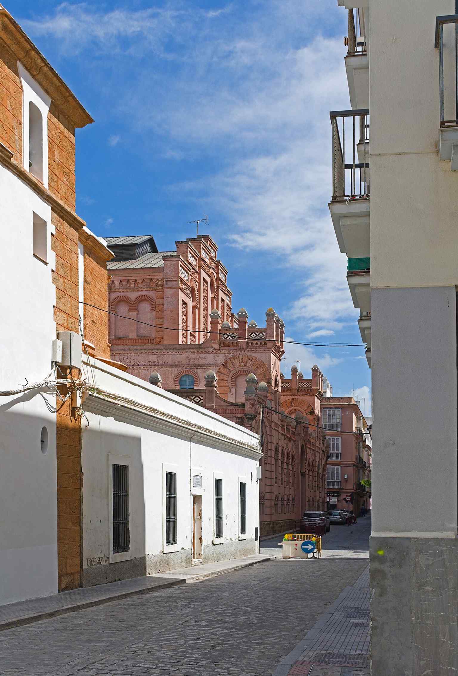The theater on Calle Benito Pérez Galdós, showing its urban setting near the university and neighboring historic buildings in Cádiz.